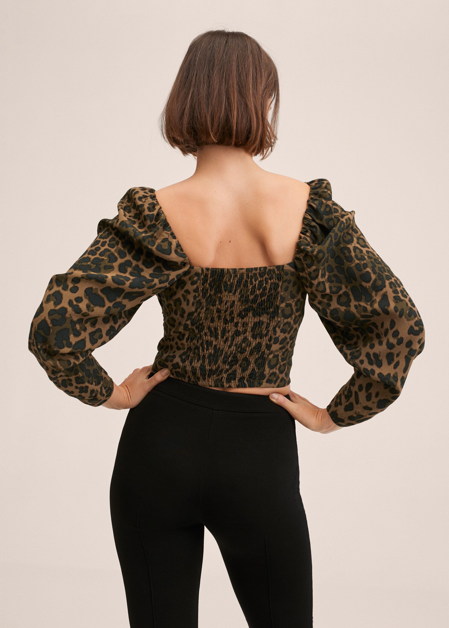 Puff-sleeved cropped blouse - Reverse of the article