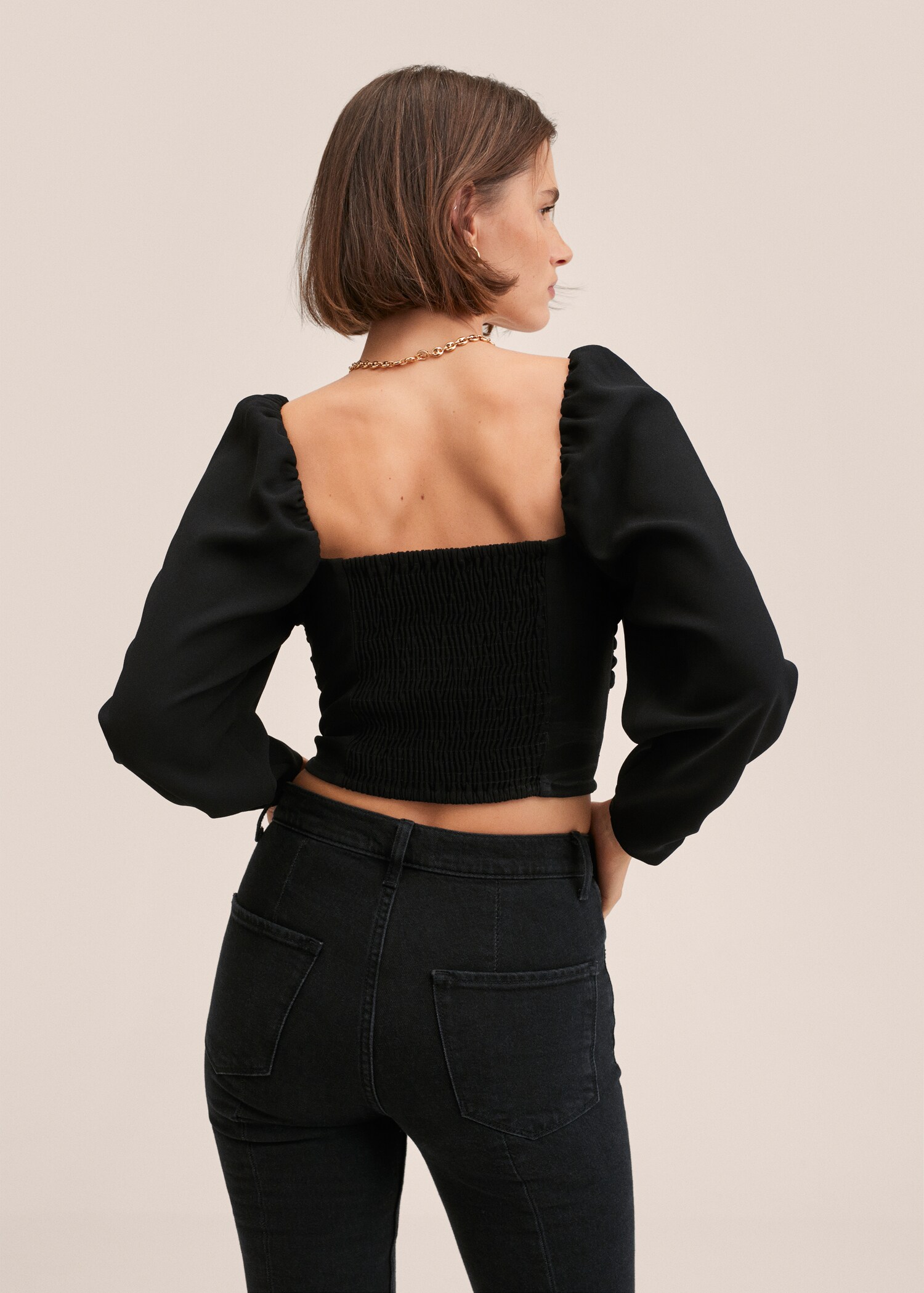 Puff-sleeved cropped blouse - Reverse of the article
