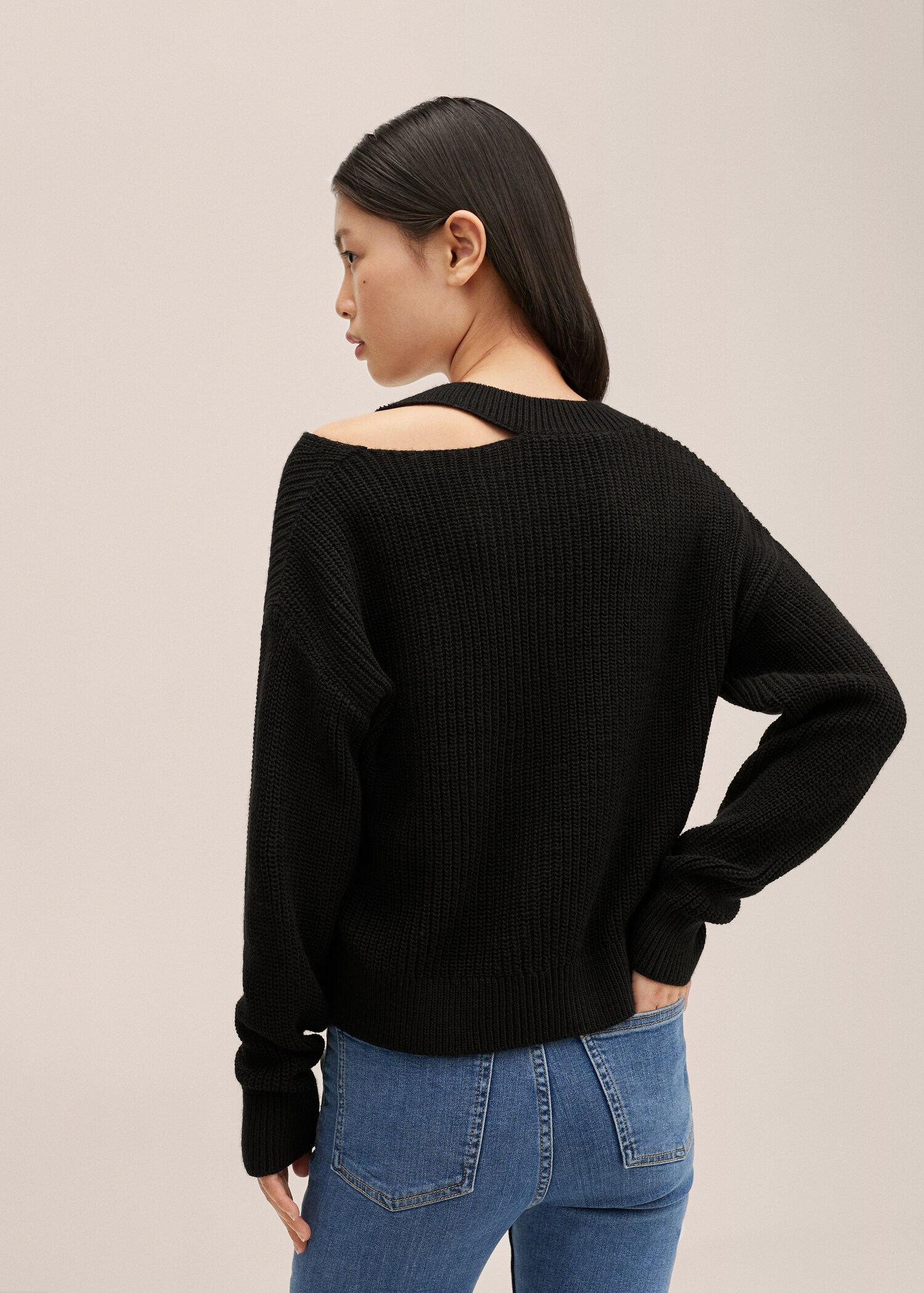 Cut-out knitted sweater - Reverse of the article