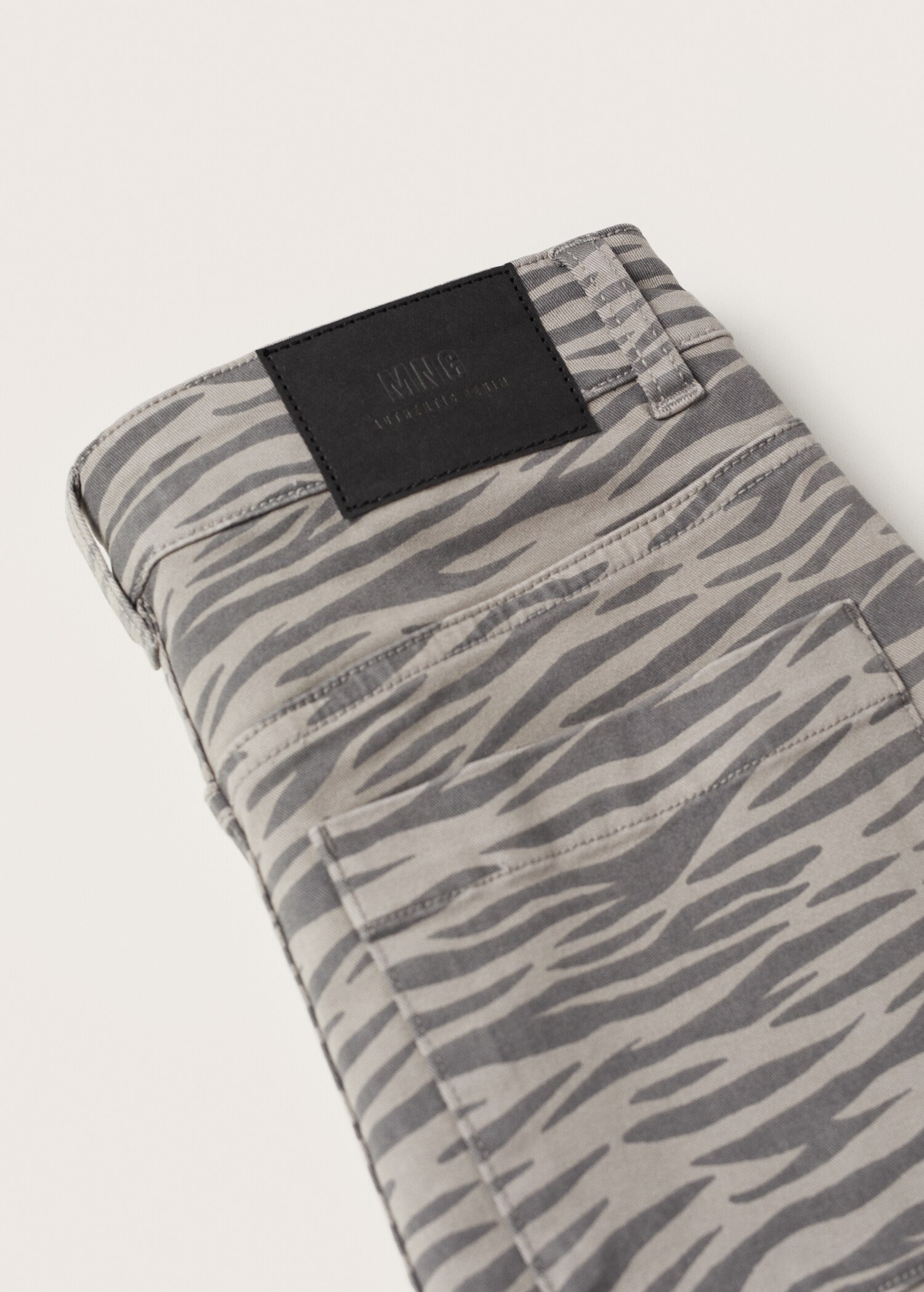 Tiger-print trousers - Details of the article 8