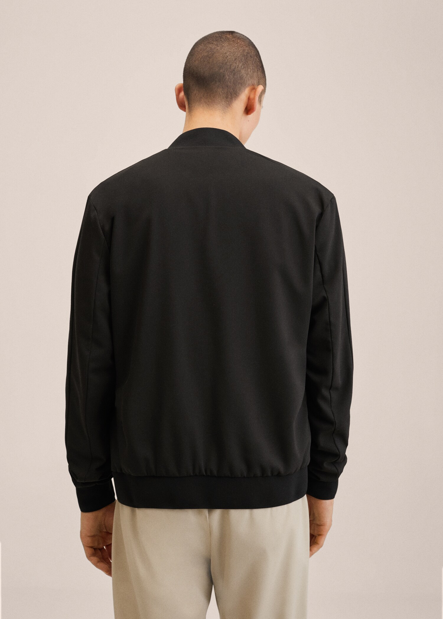Chaqueta bomber empacable - Reverso del artículo