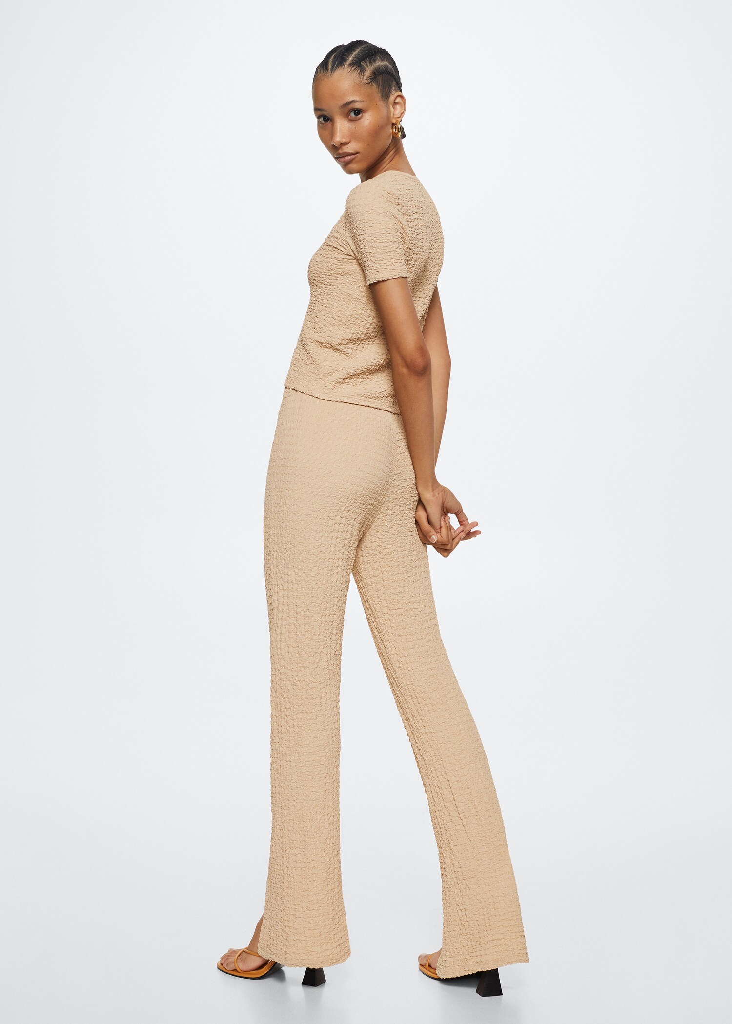 Opening texture trousers - Reverse of the article