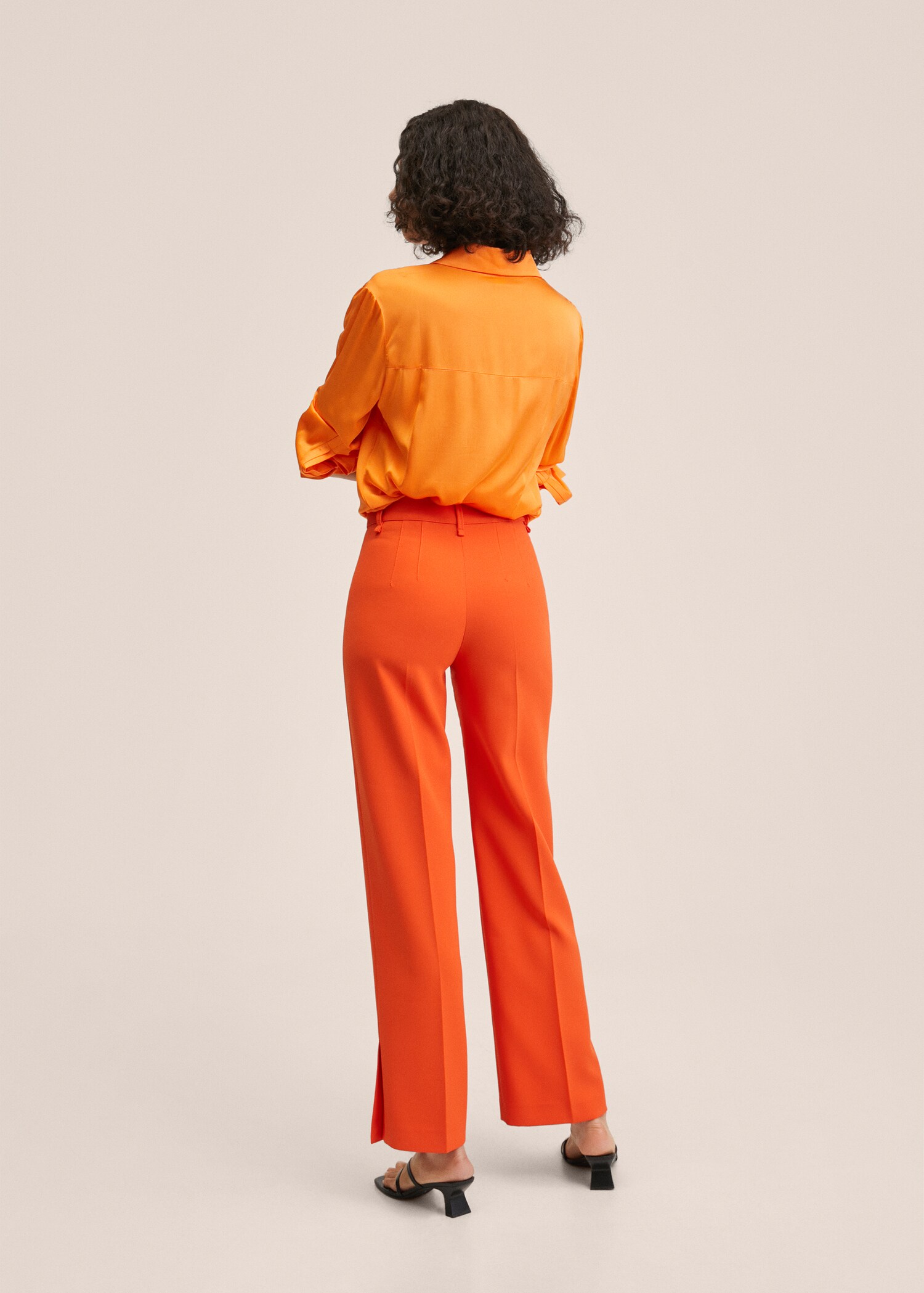 Straight trousers with openings - Reverse of the article