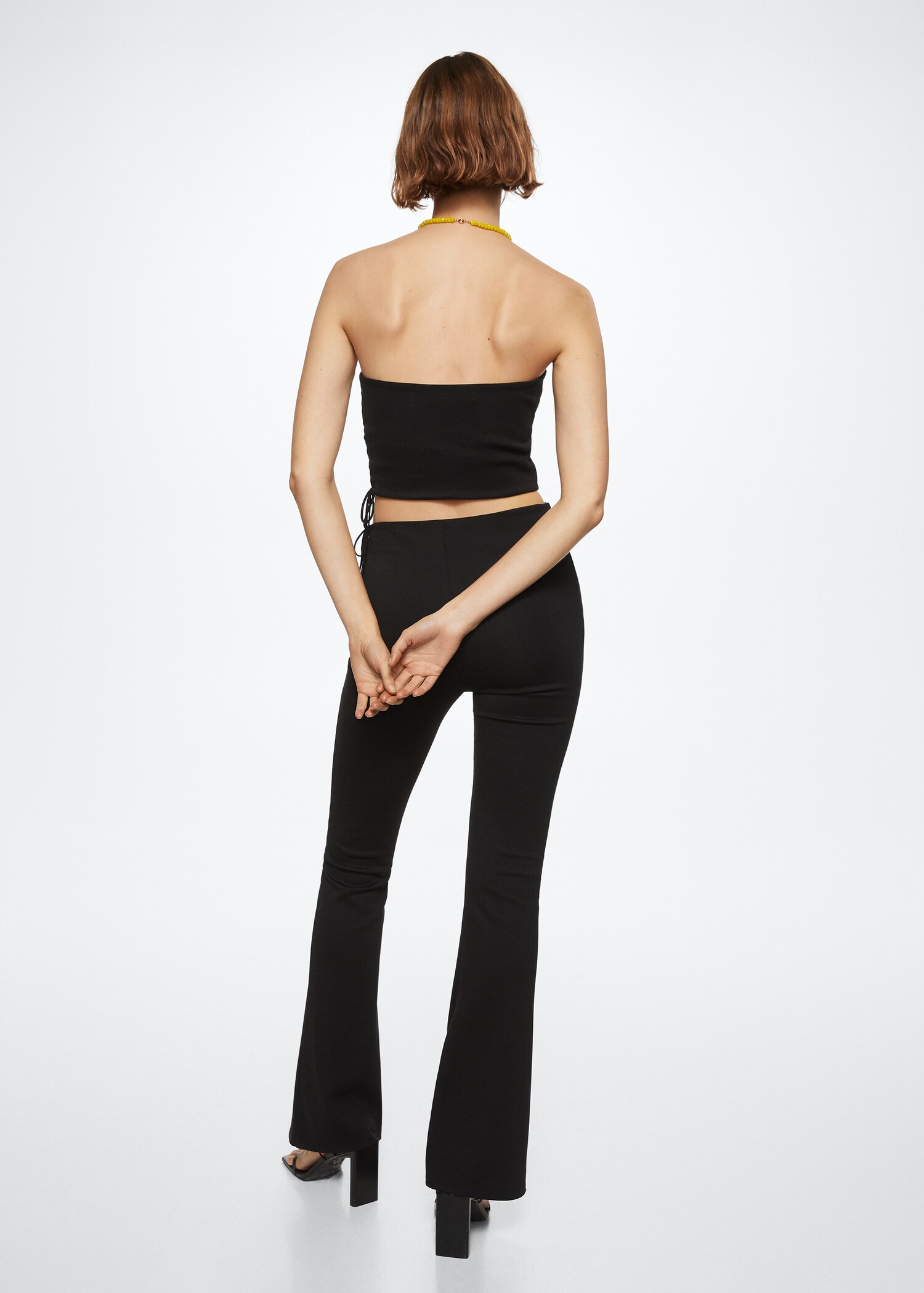 Side slit flowy trousers - Reverse of the article