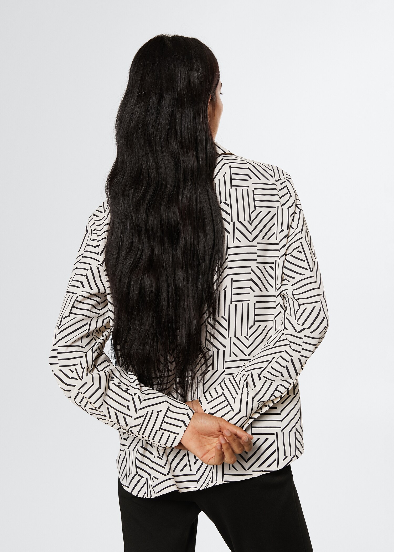 Buttoned flowy shirt - Reverse of the article