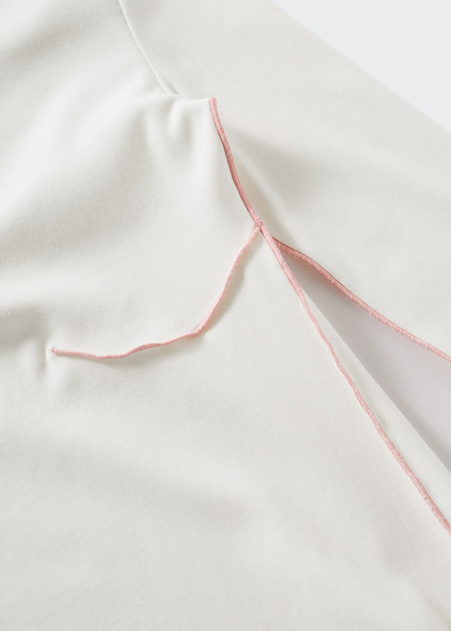 Solidair T-shirt met sierstiksels - Detail van het artikel 8