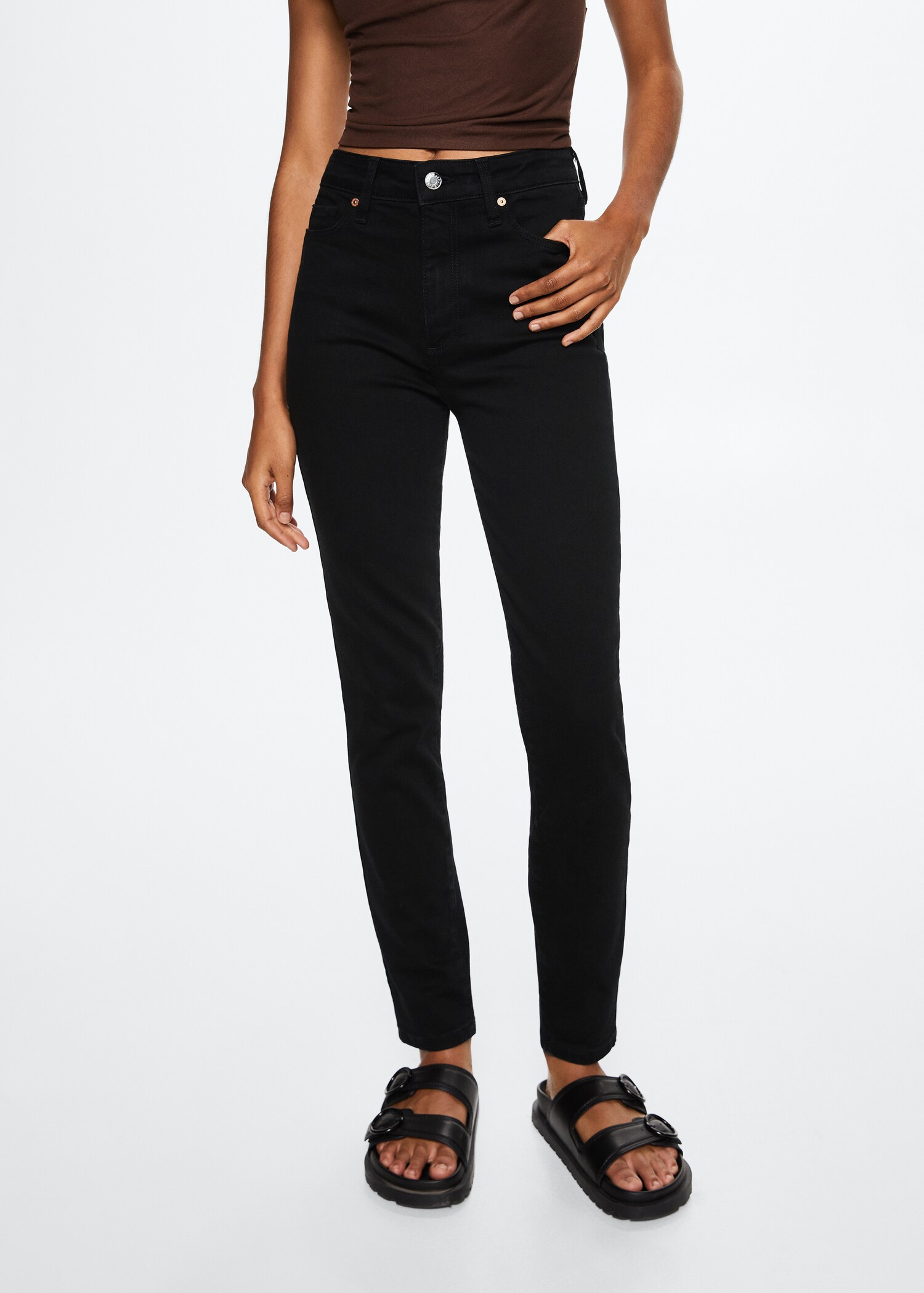Jeans skinny hög midja - Bild av mittparti