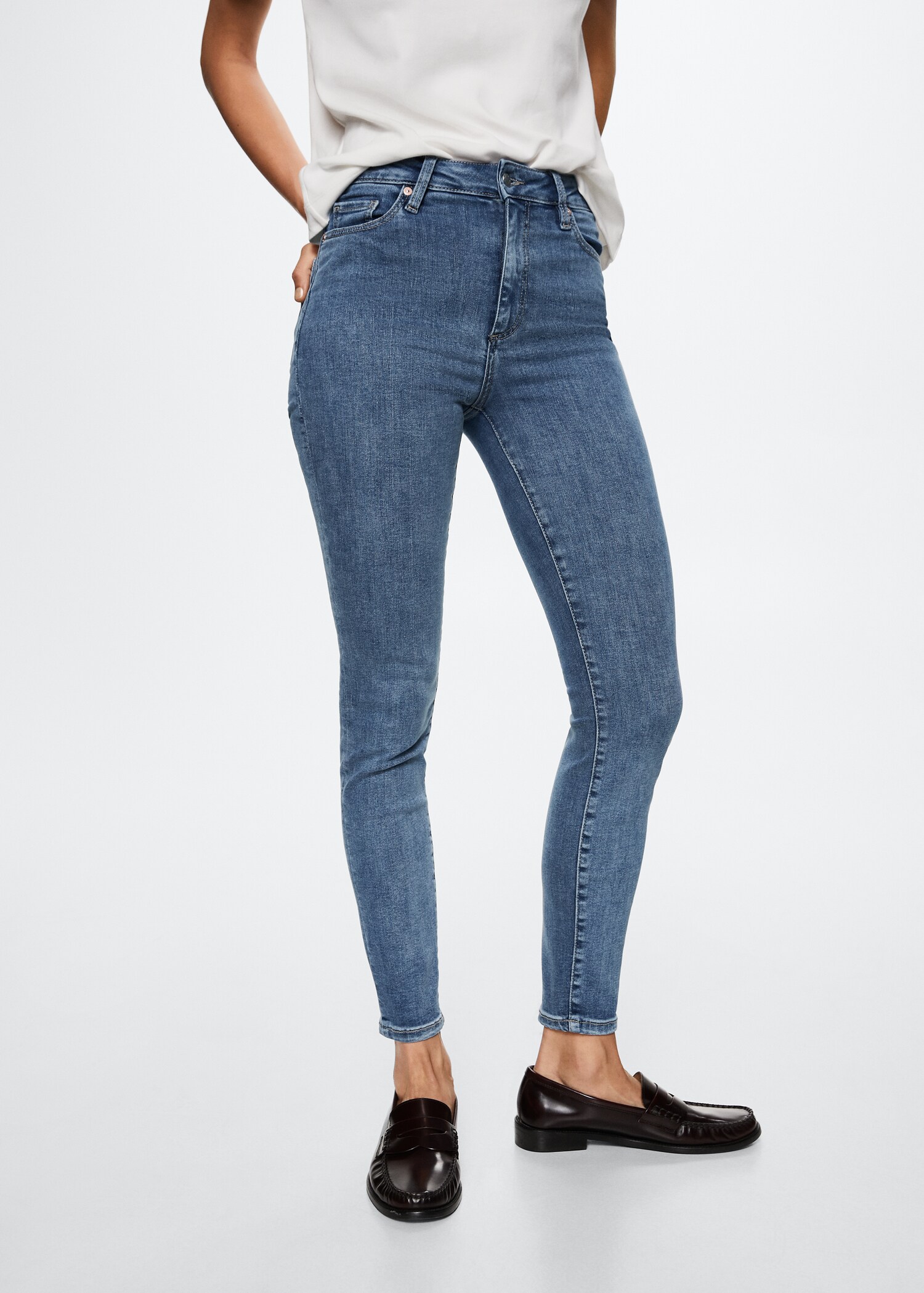 Jeans skinny hög midja - Bild av mittparti