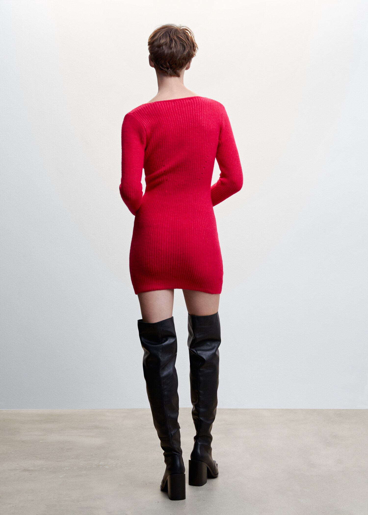 Short knitted dress - Reverse of the article
