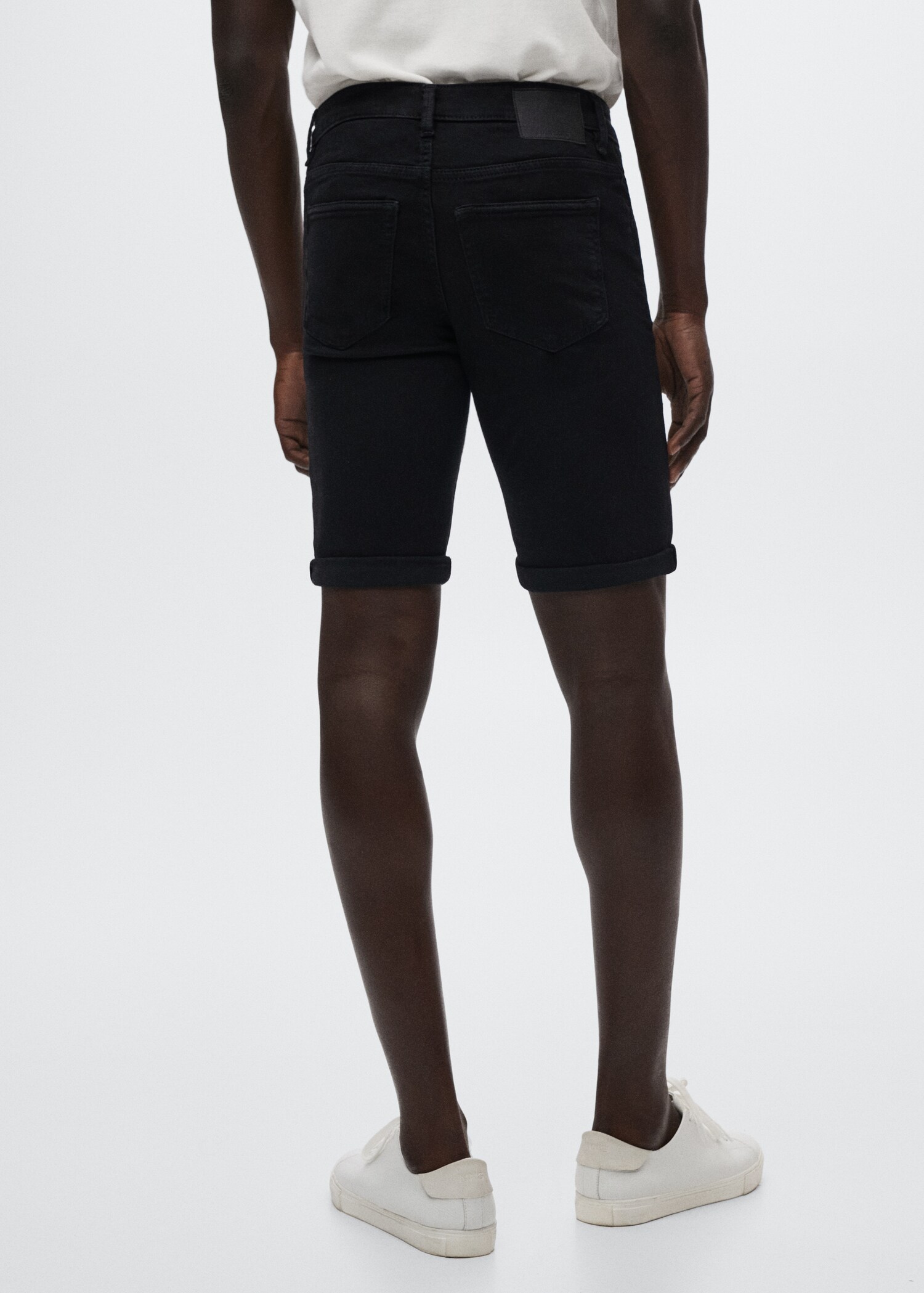 Slim-fit denim bermuda shorts - Reverse of the article