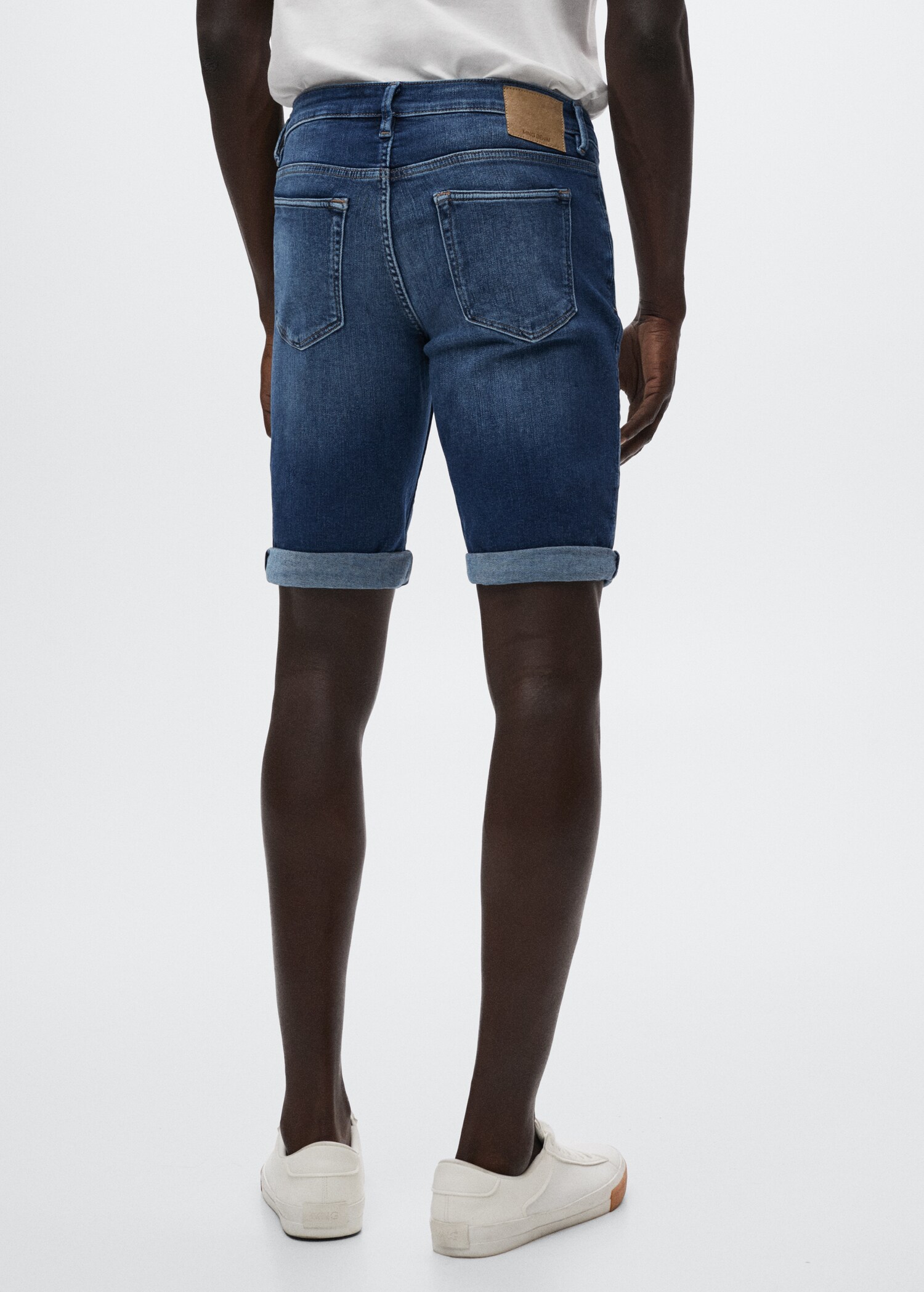 Slim-fit denim bermuda shorts - Reverse of the article