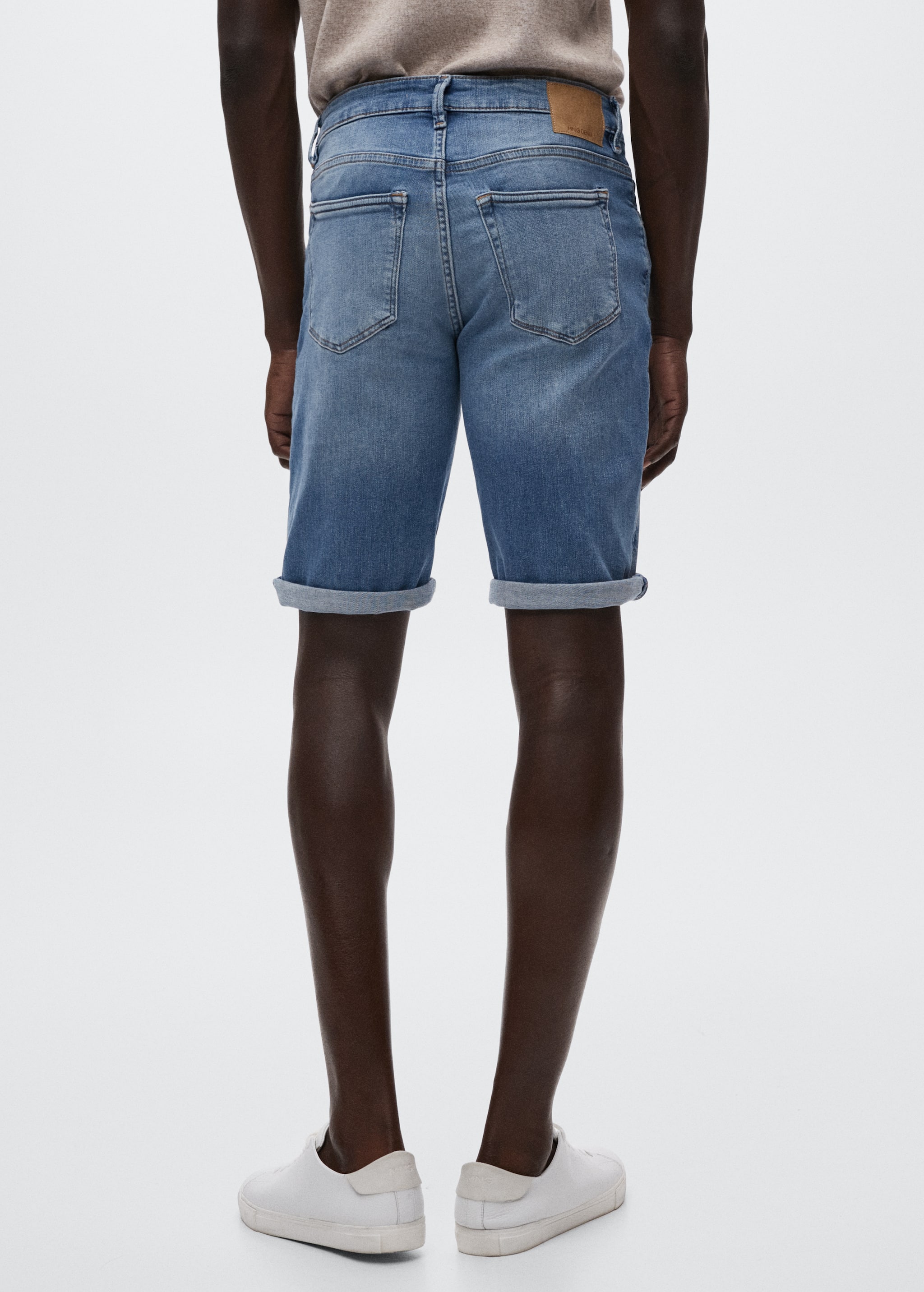 Slim-fit denim bermuda shorts - Reverse of the article
