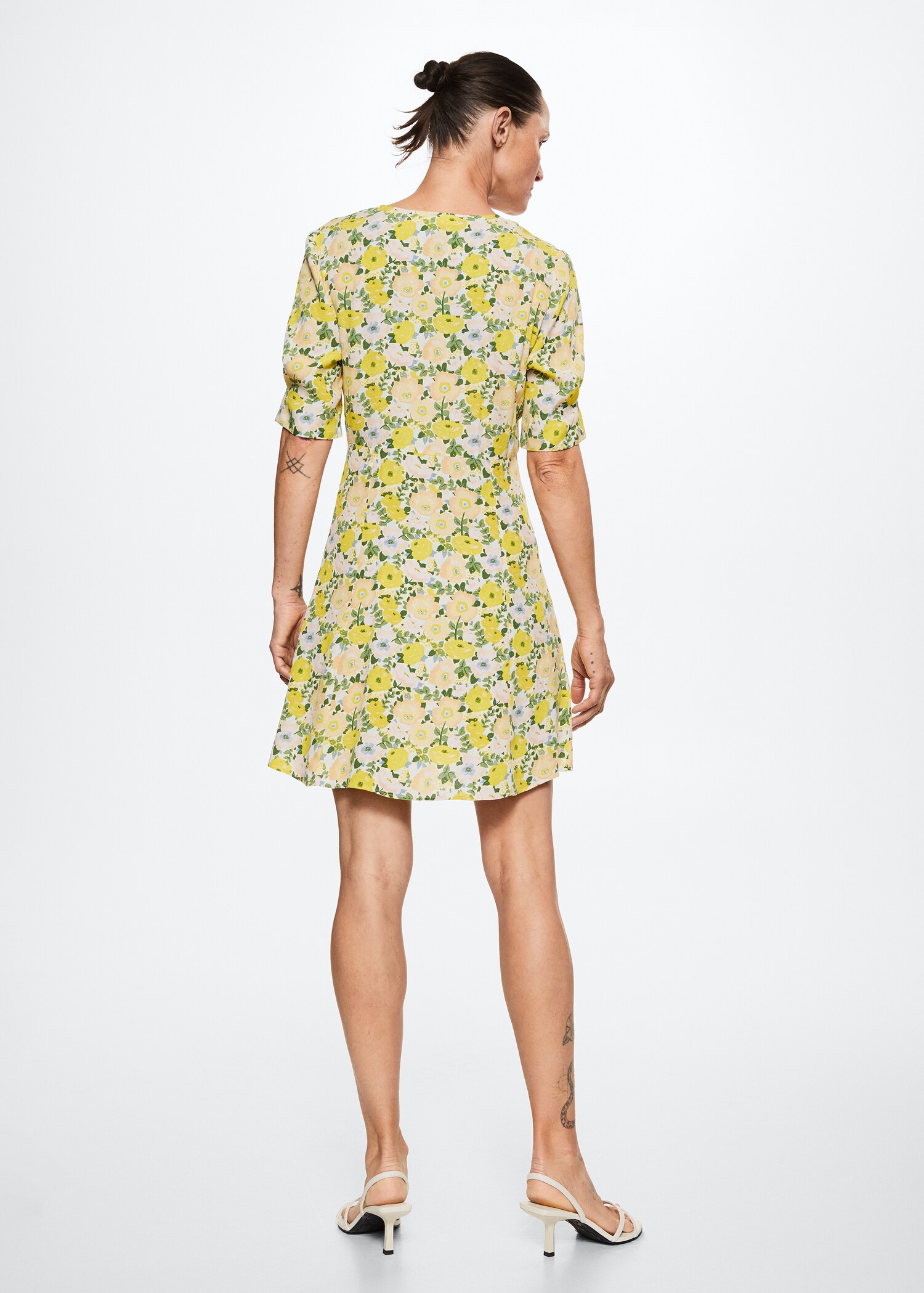 Vestit detall frunzit - Revers de l'article