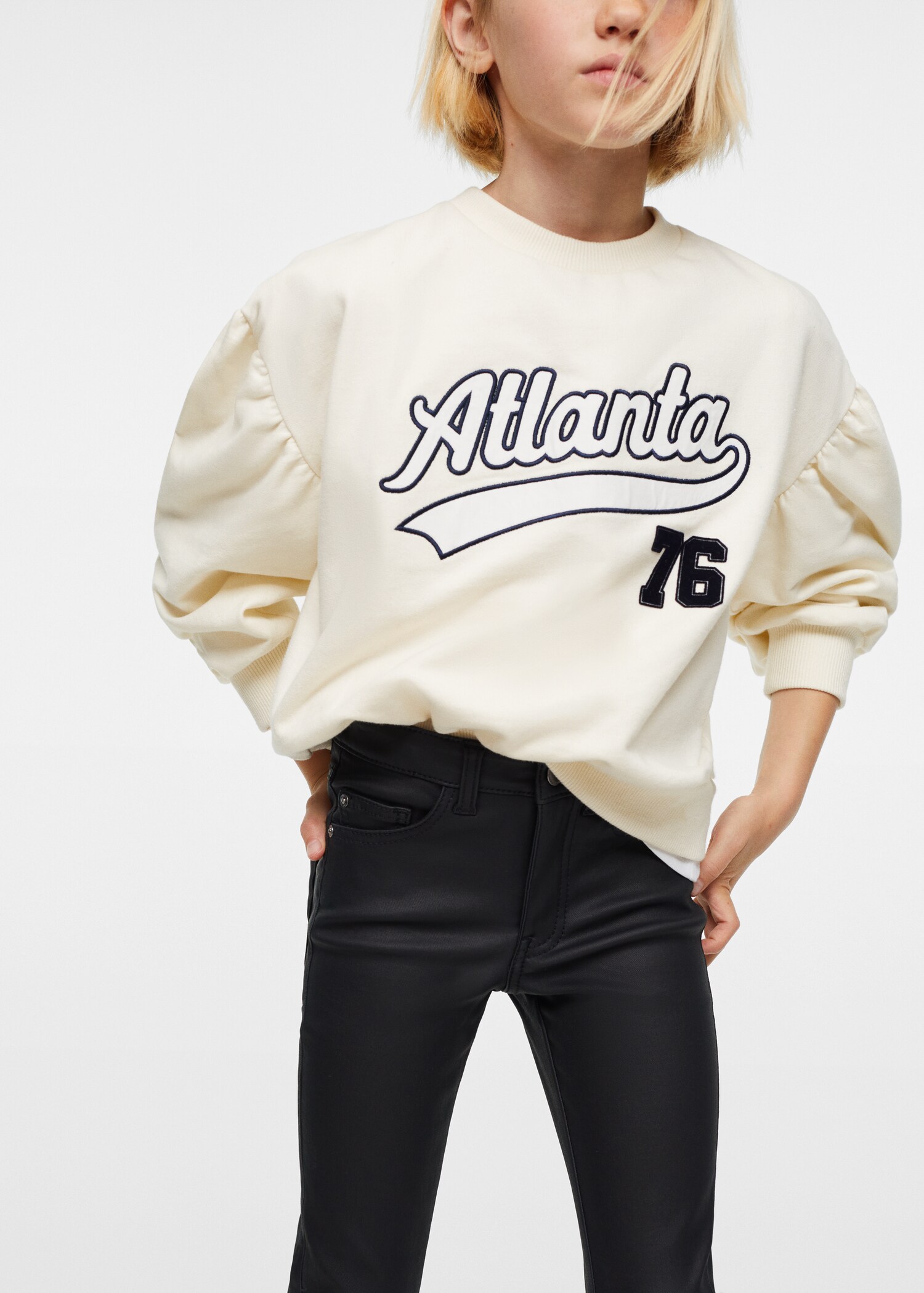 Coated flared trousers - Details of the article 1