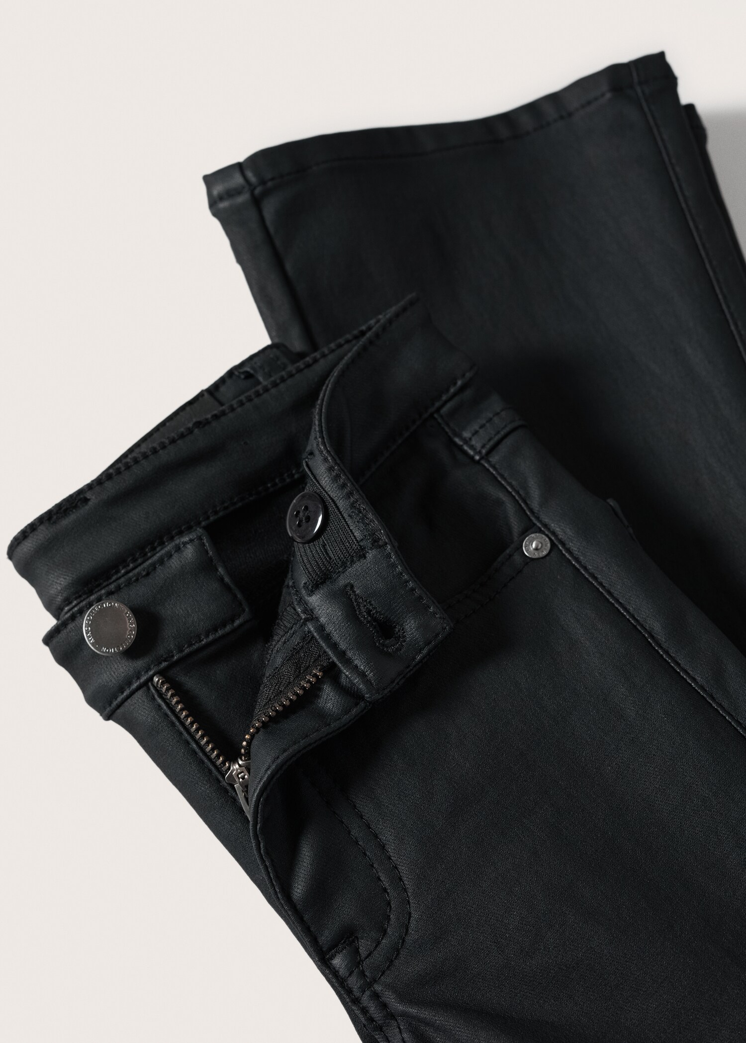 Coated flared trousers - Details of the article 8