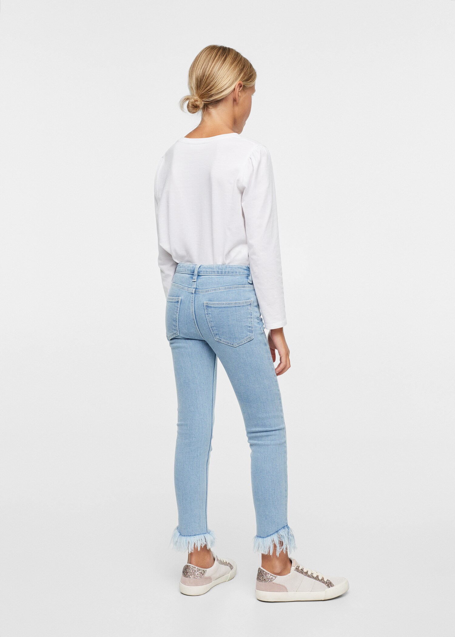 Skinny jeans with frayed hem  - Details of the article 3