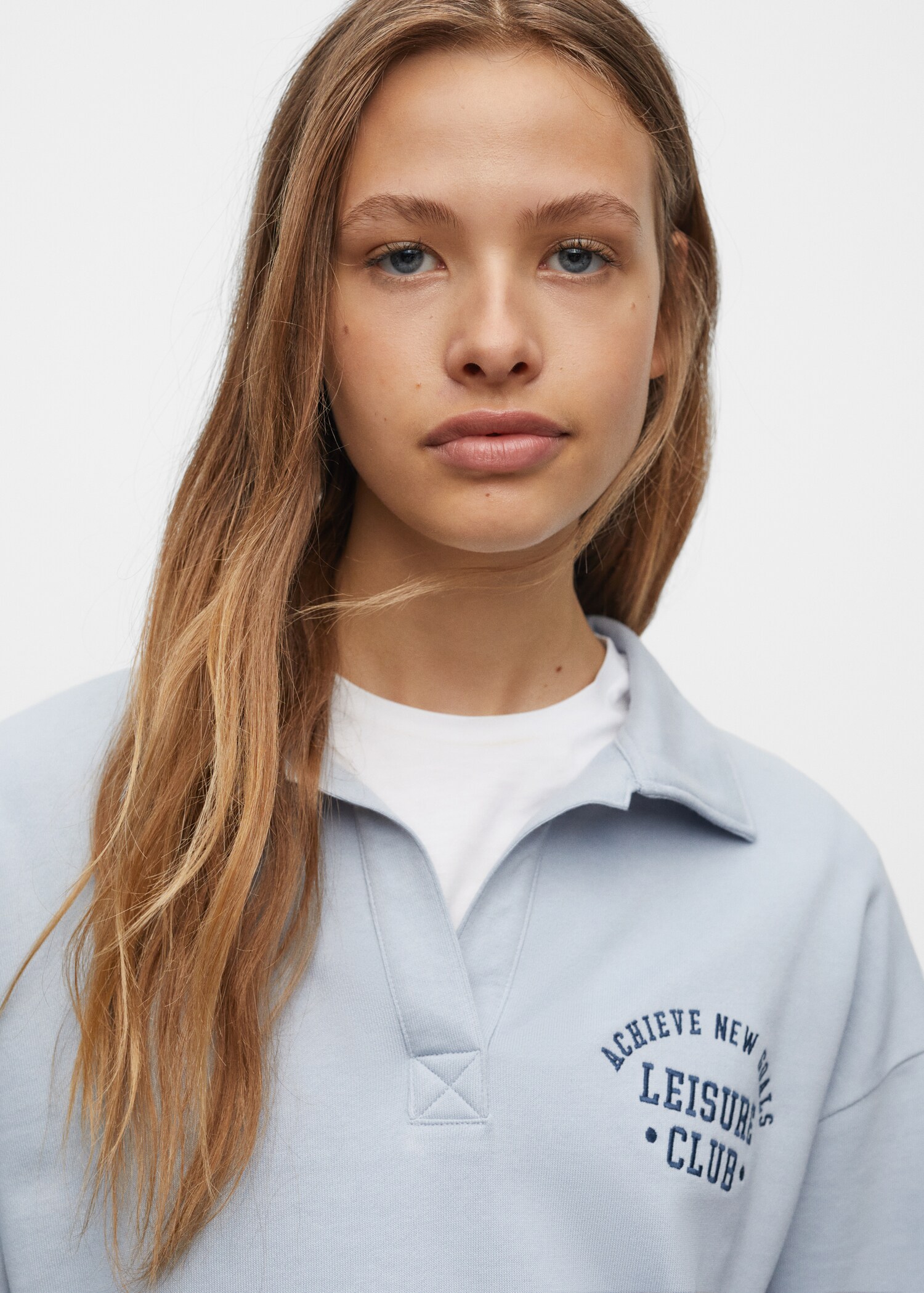 Polo sweatshirt with message - Details of the article 1