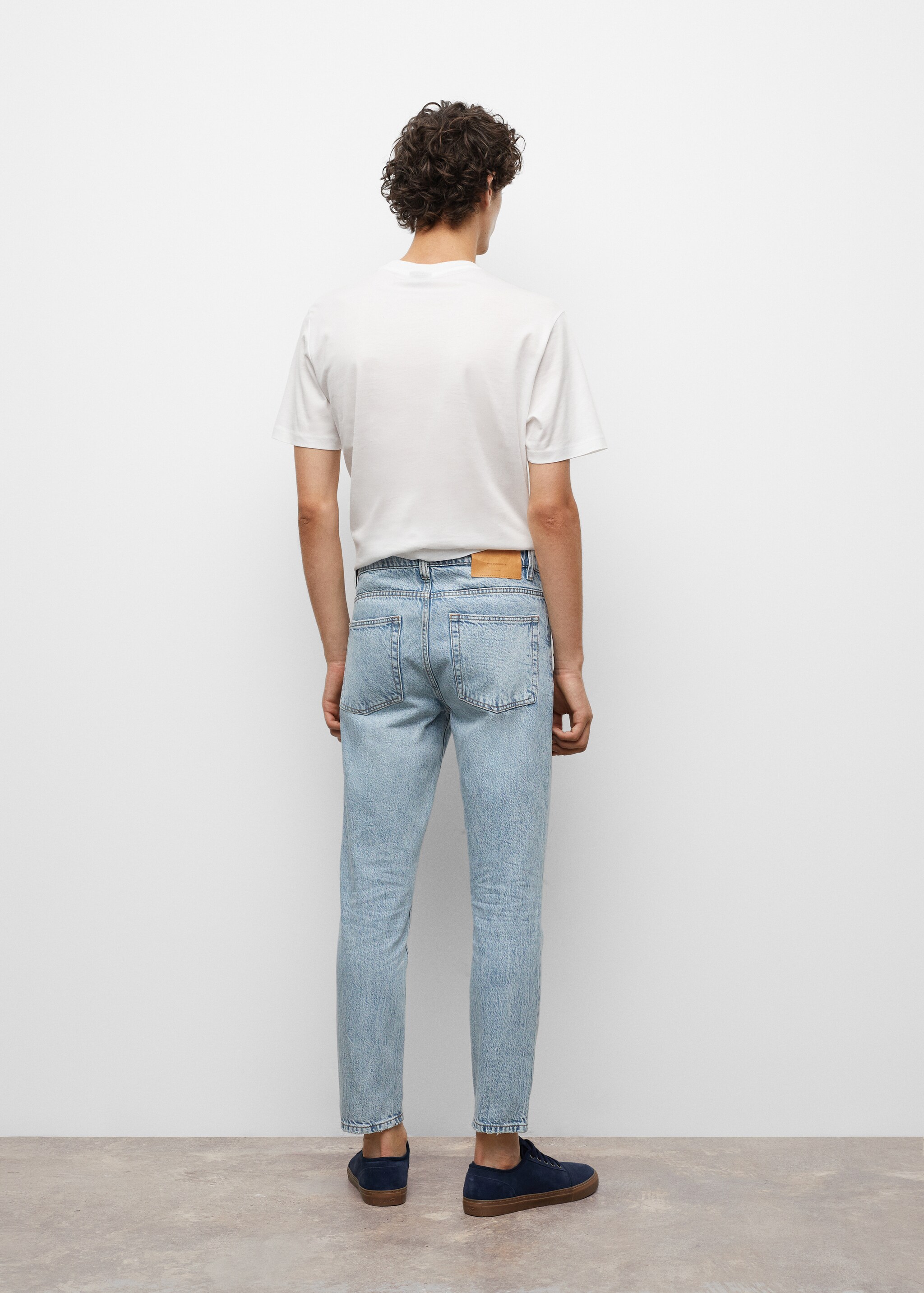 Ankle-length straight-fit jeans - Reverse of the article