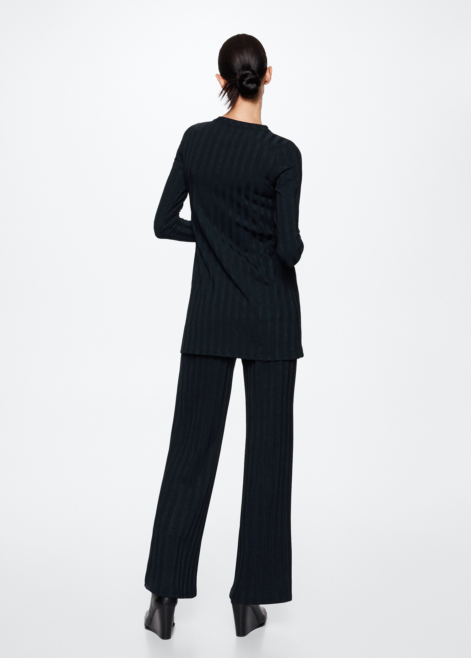 Pantalons punt acampanats - Revers de l'article