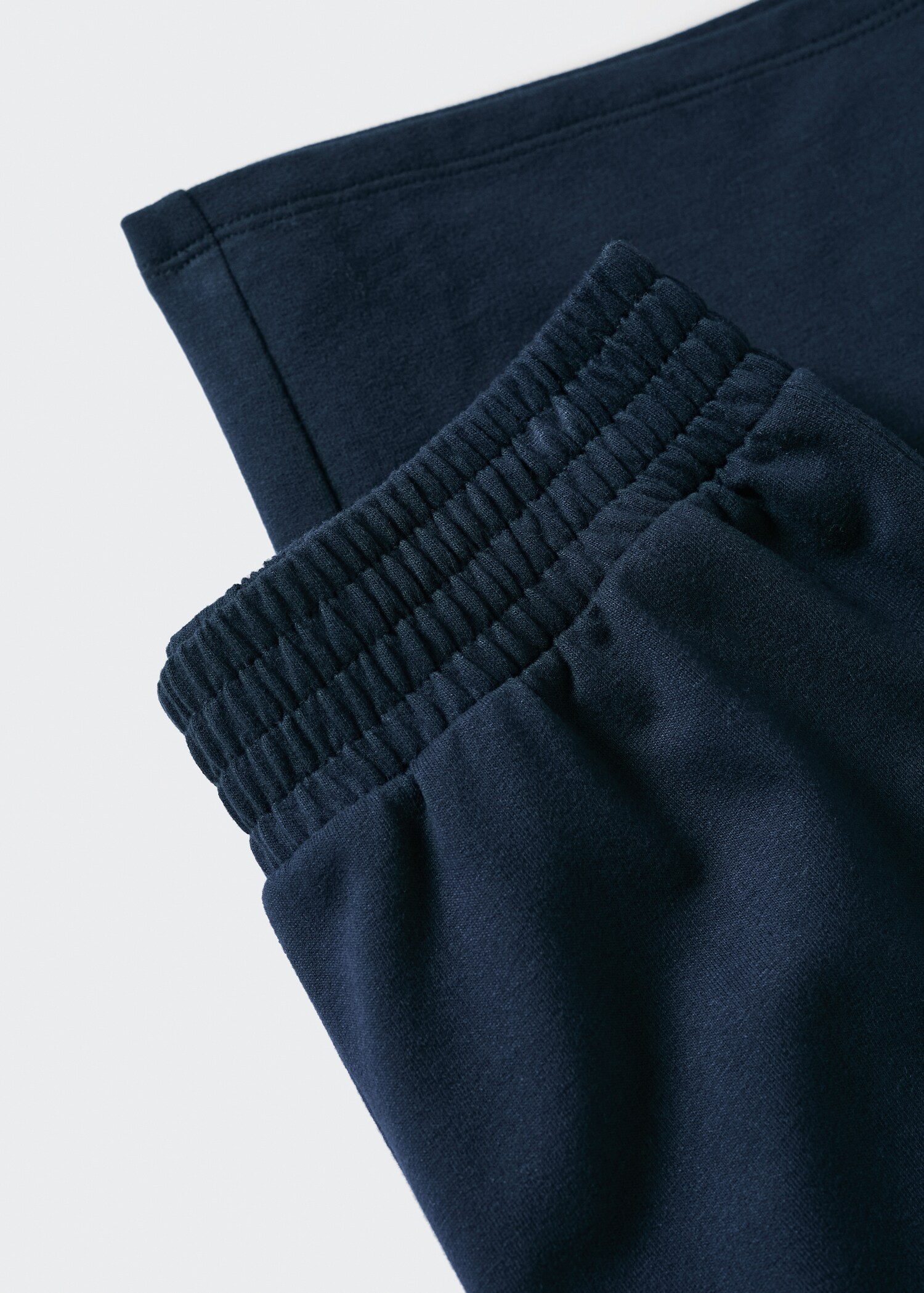 Knit jogger-style trousers - Details of the article 8