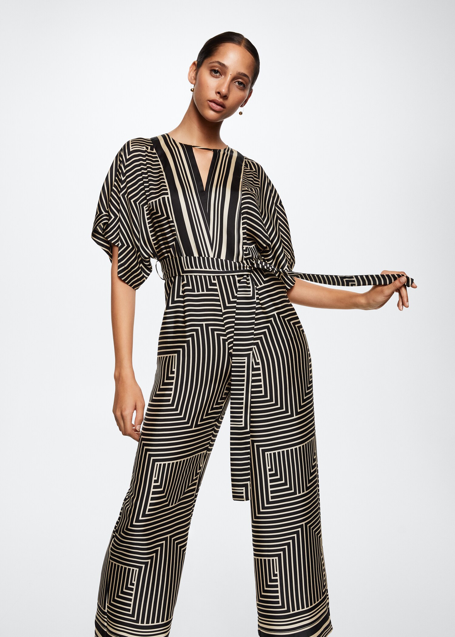 Geometrisk tryck jumpsuit - Bild av mittparti