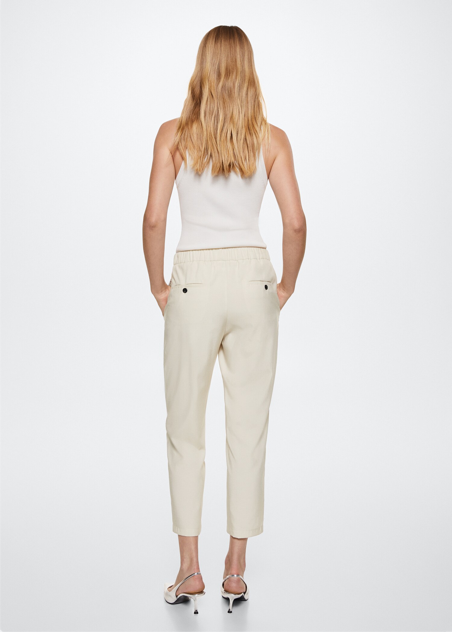 Elastic waist trousers - Reverse of the article
