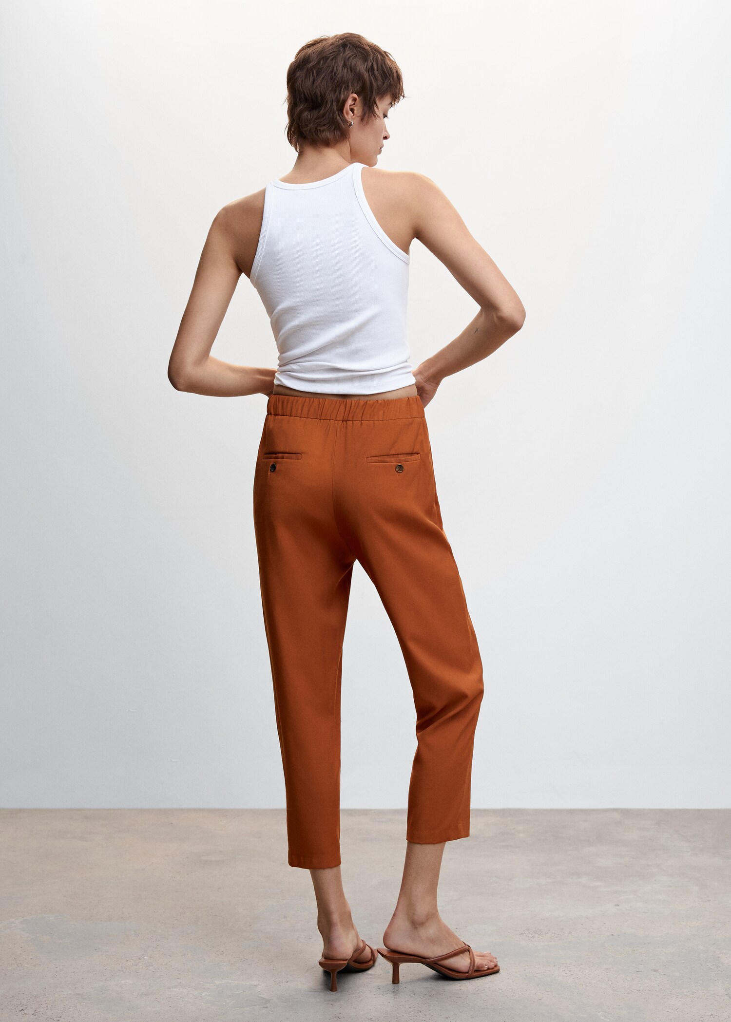 Elastic waist trousers - Reverse of the article