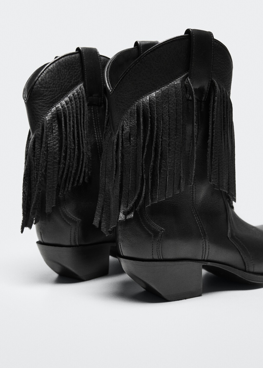 Fringed leather boots