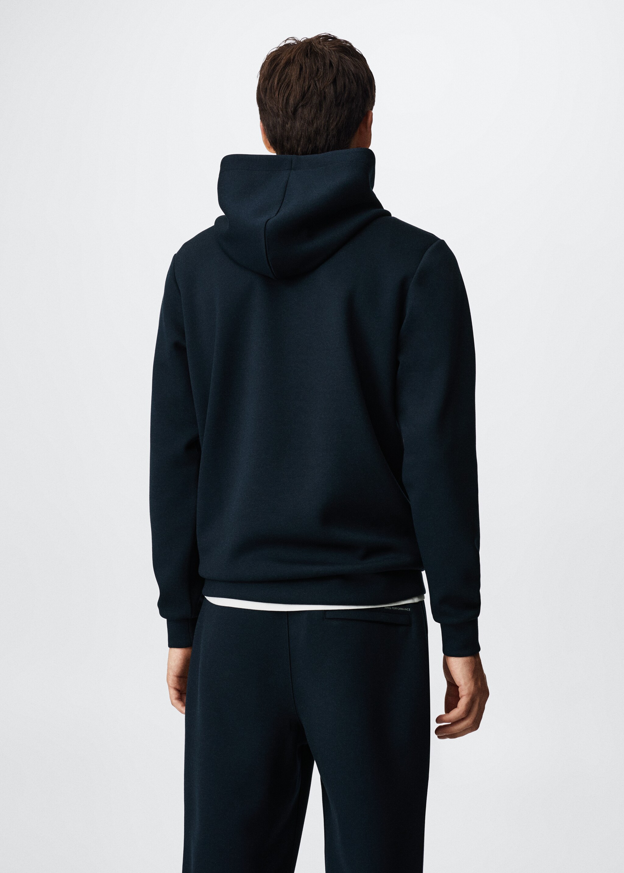 Hooded breathable sweatshirt - Reverse of the article