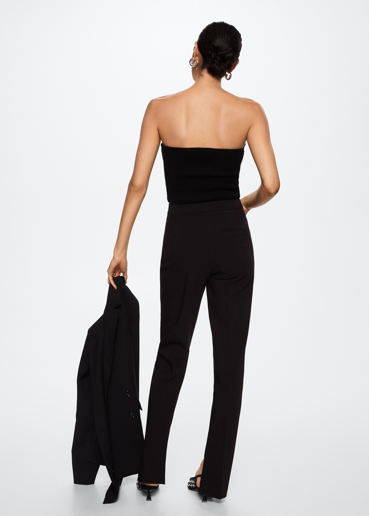 Slit hem trousers - Reverse of the article