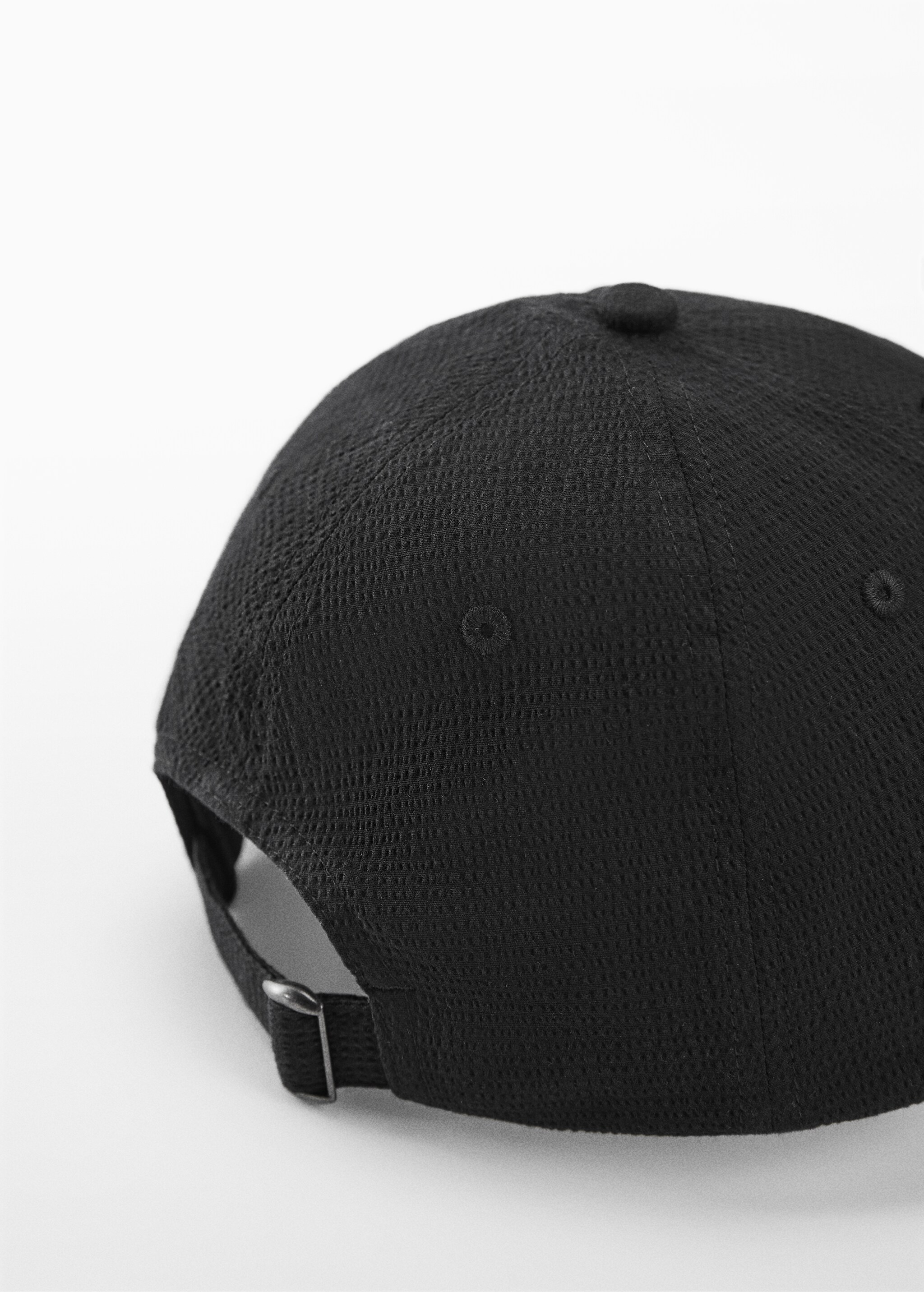 Textured cap with visor - Details of the article 1