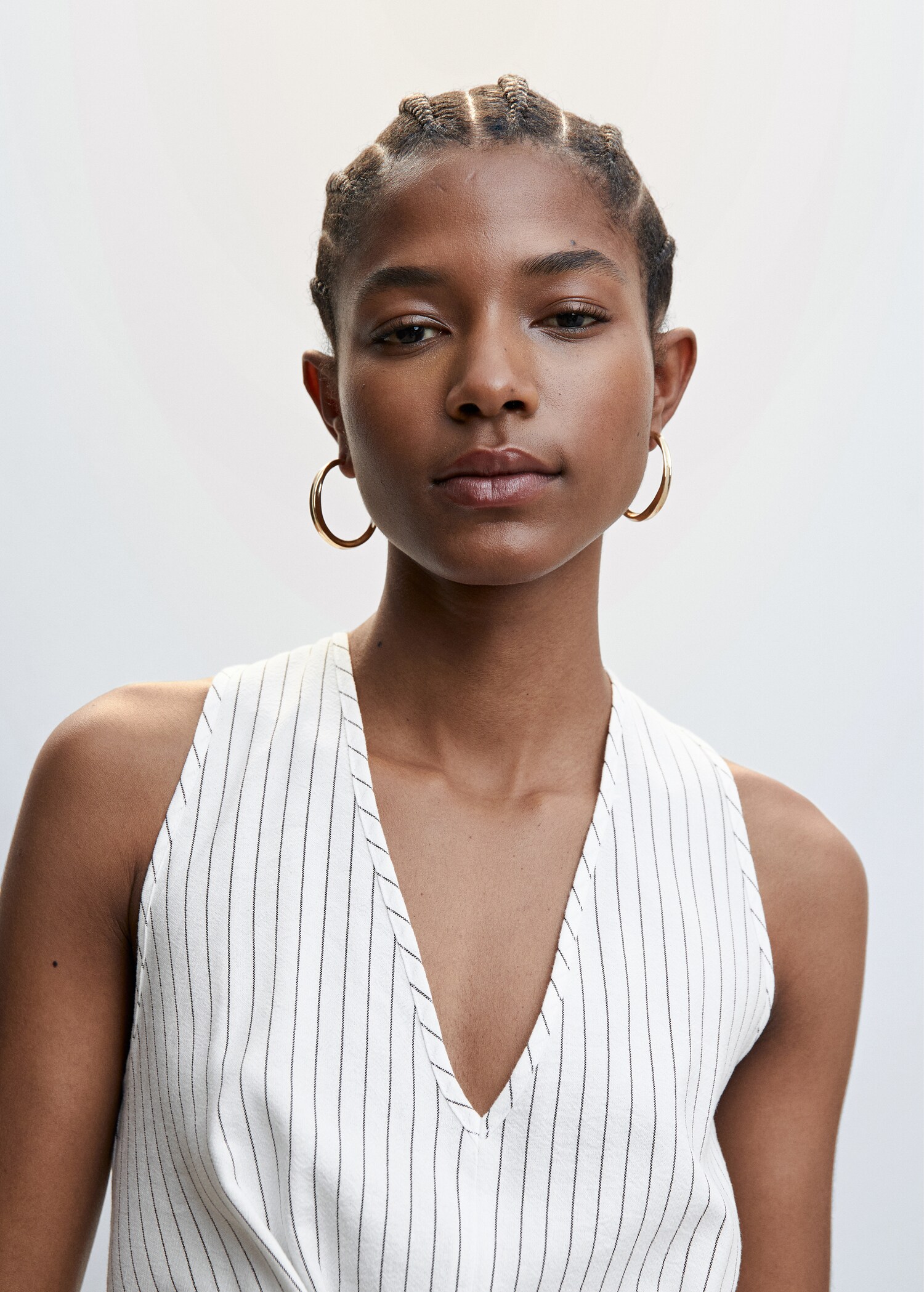 Striped jumpsuit with knot detail - Details of the article 1