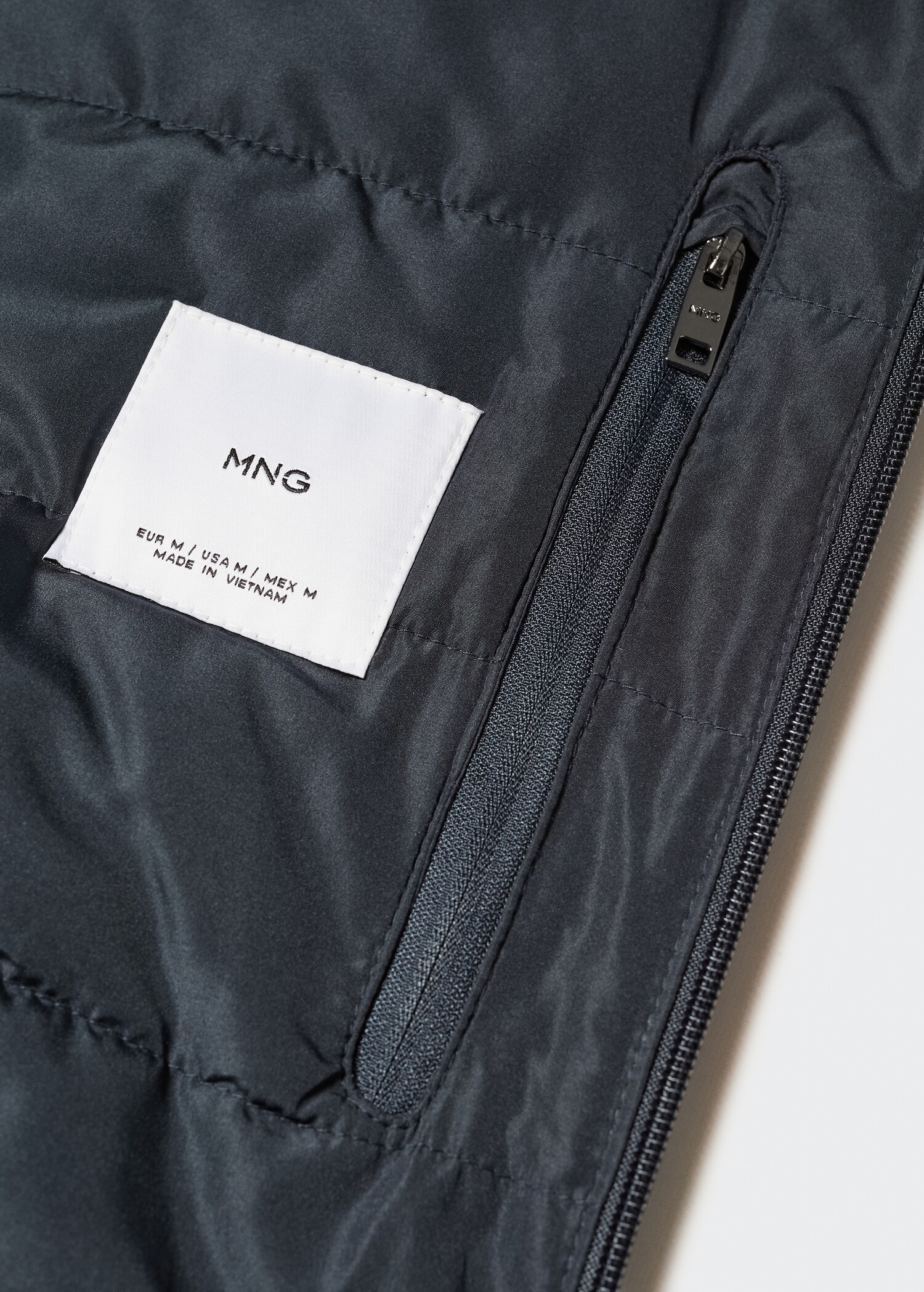 Jaqueta impermeable caputxa - Detall de l'article 8