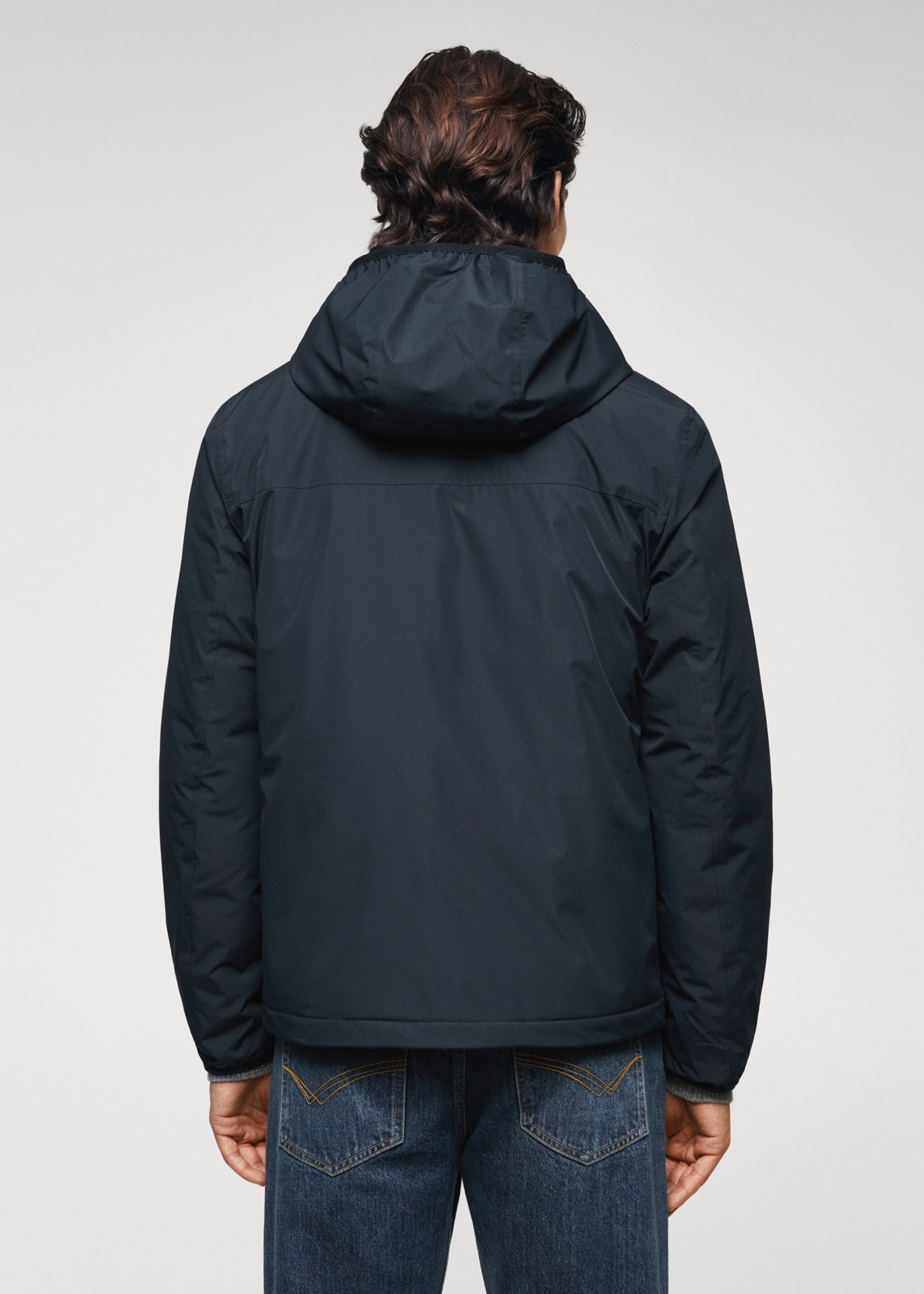 Veste imperméable à capuche - Verso de l’article