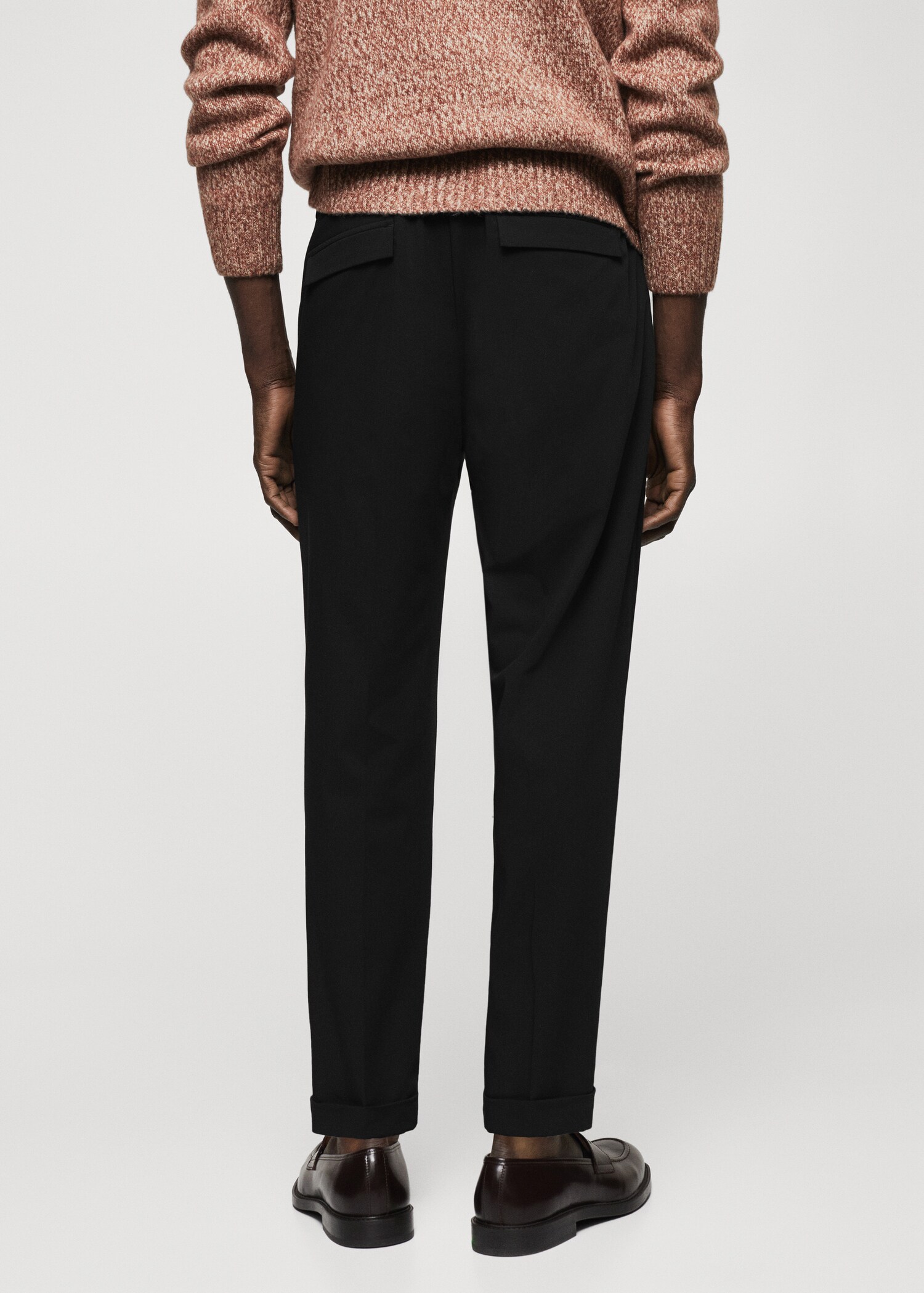 Pleated slim-fit pants - Reverse of the article