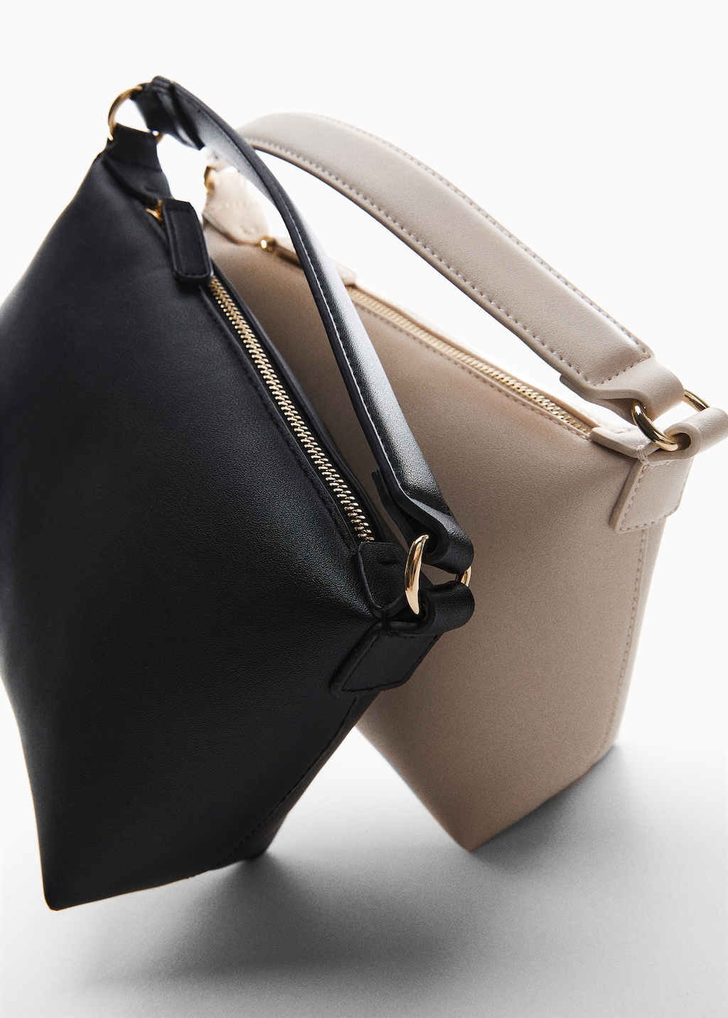 Crossbody bag with handle clearance