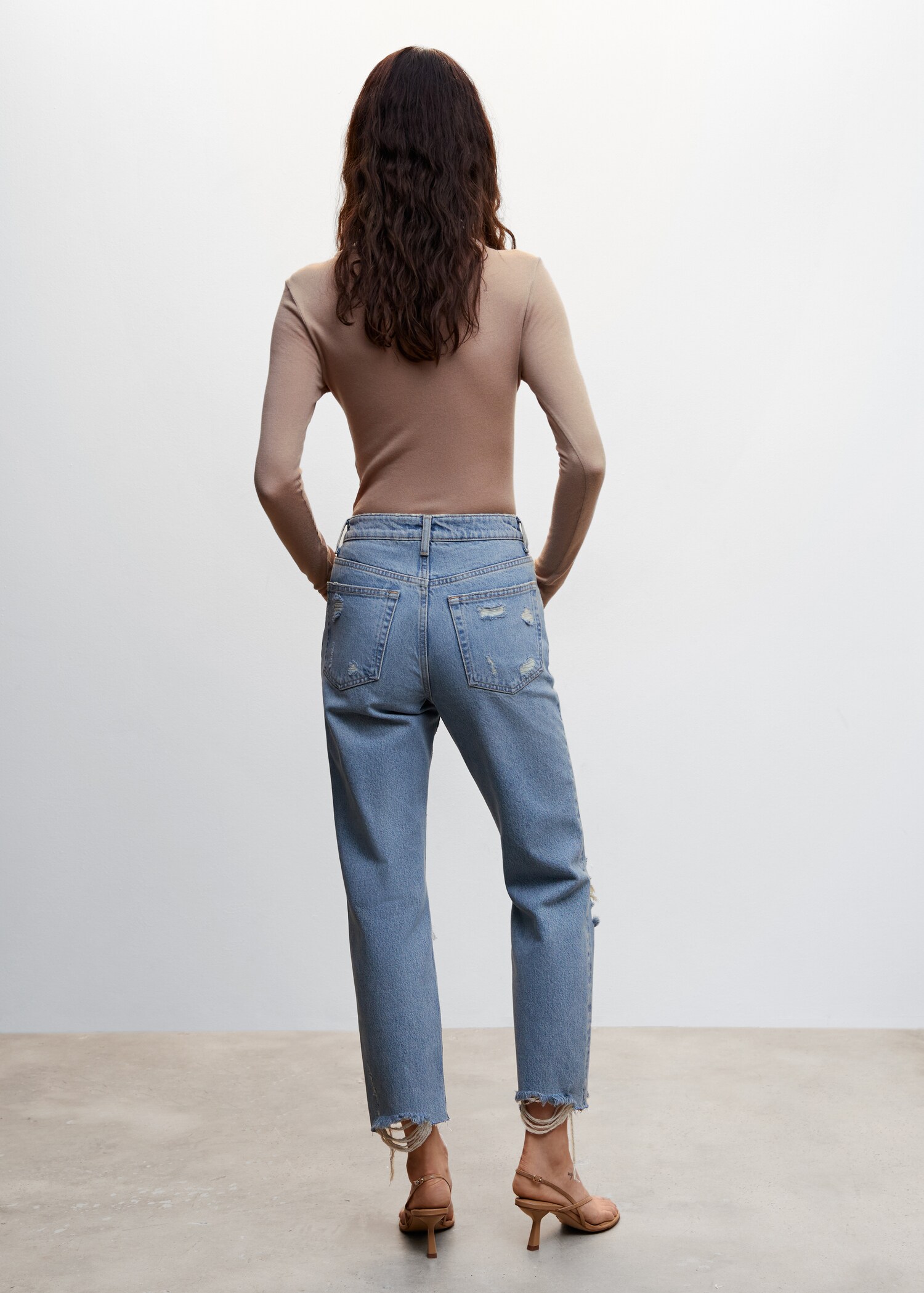Ripped high-rise straight jeans - Reverse of the article
