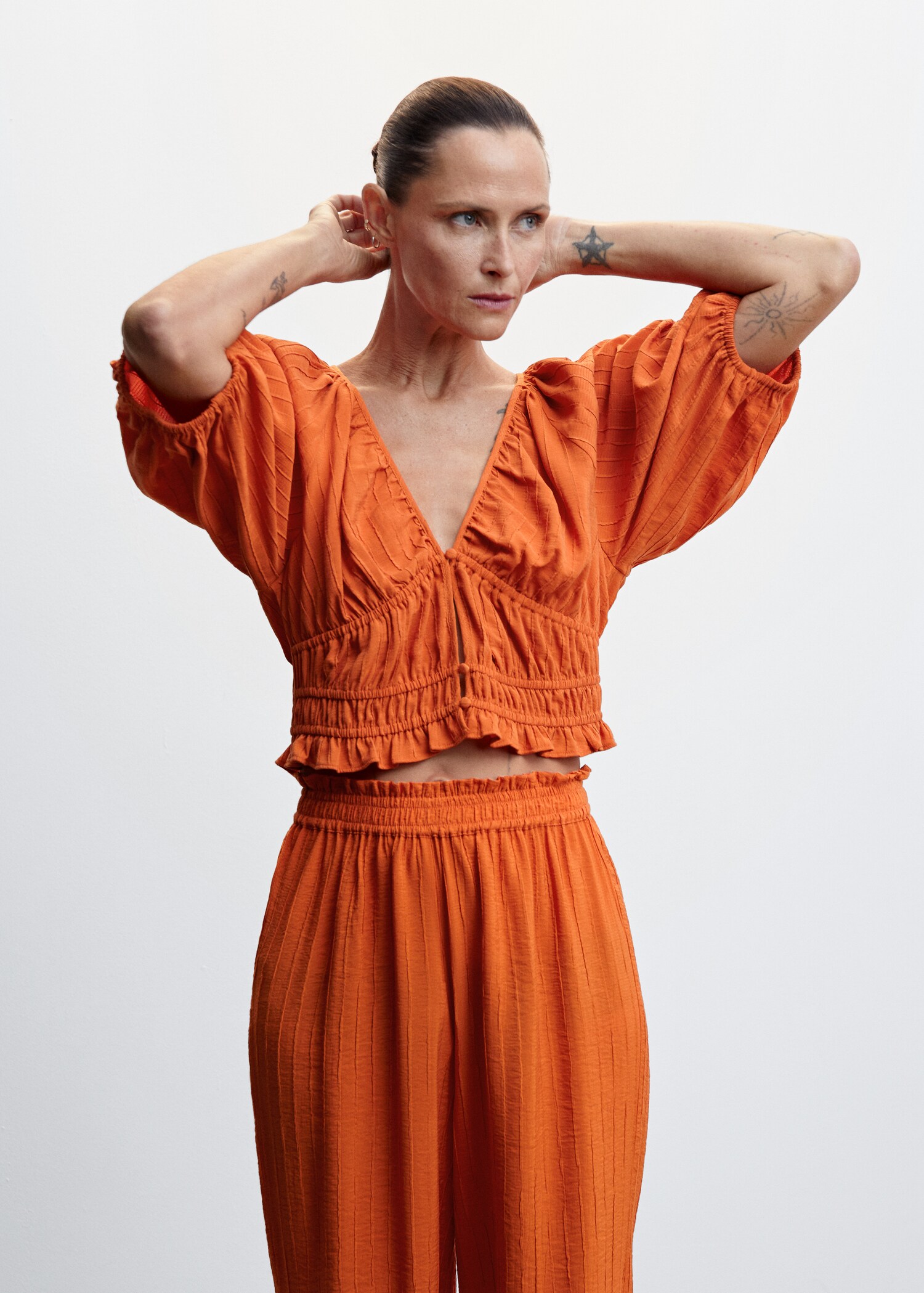 Puff sleeve ruched blouse Women MANGO OUTLET Netherlands - Main Image