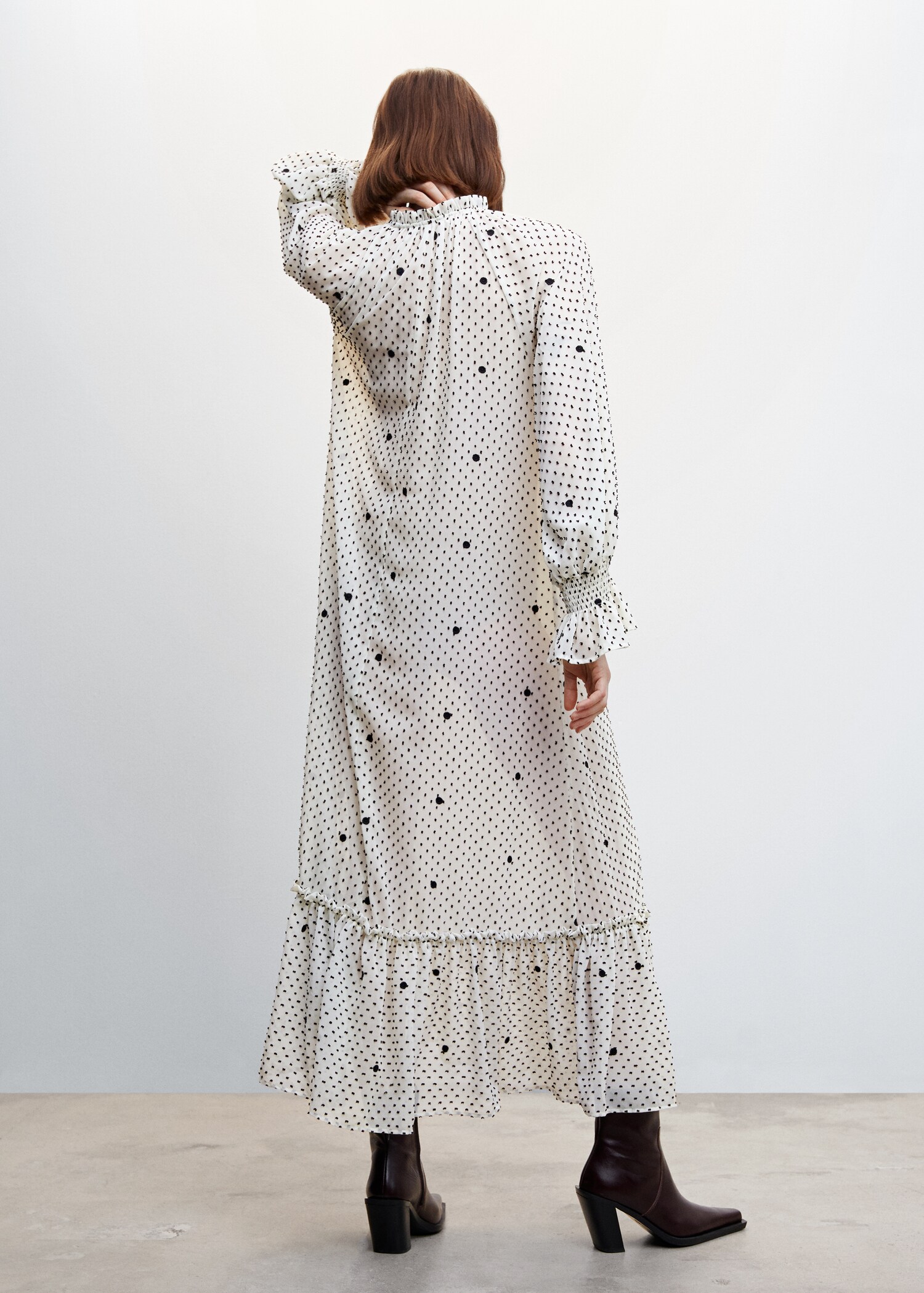 Polka-dot dress with ruffles - Reverse of the article