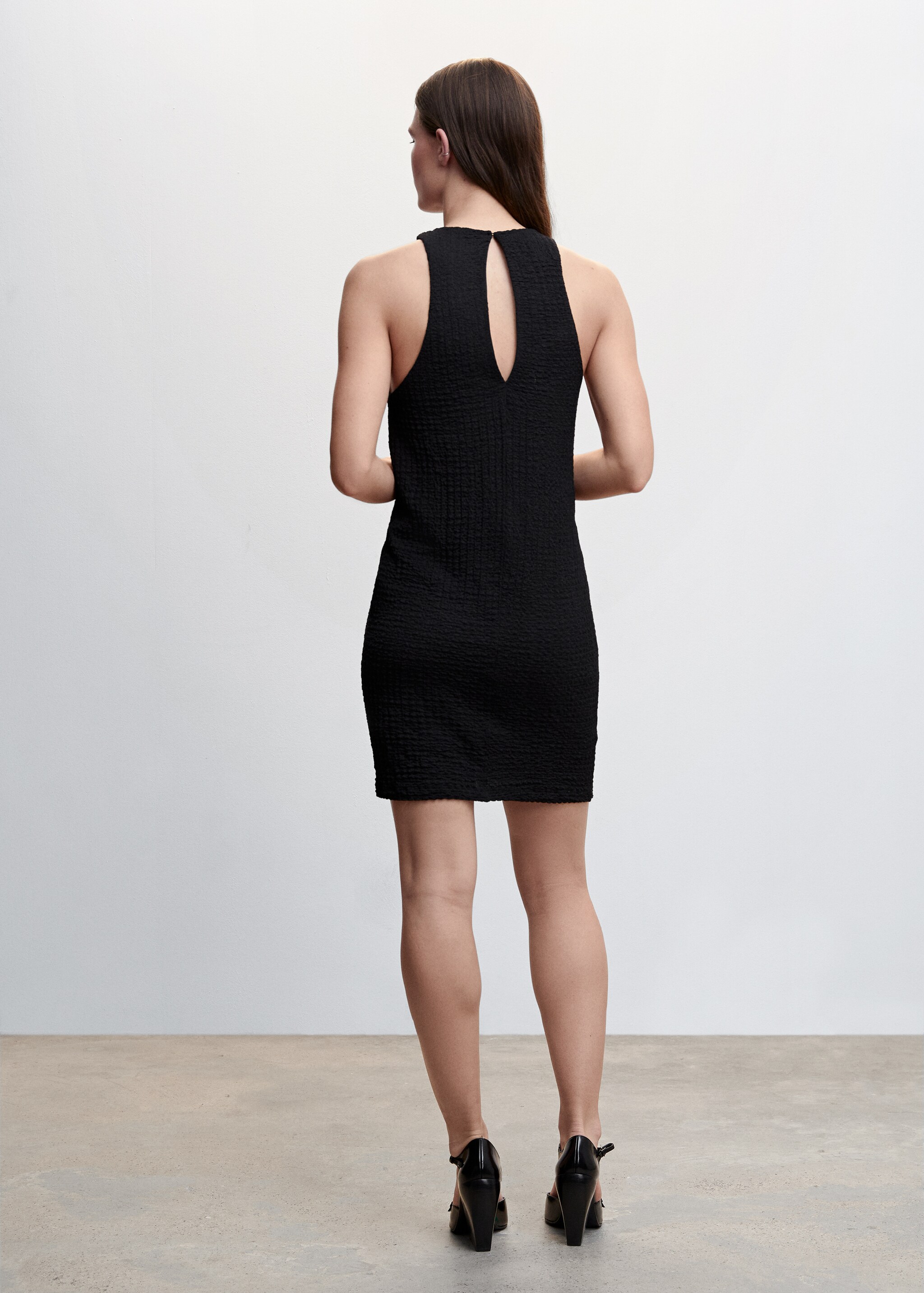 Textured short dress - Reverse of the article