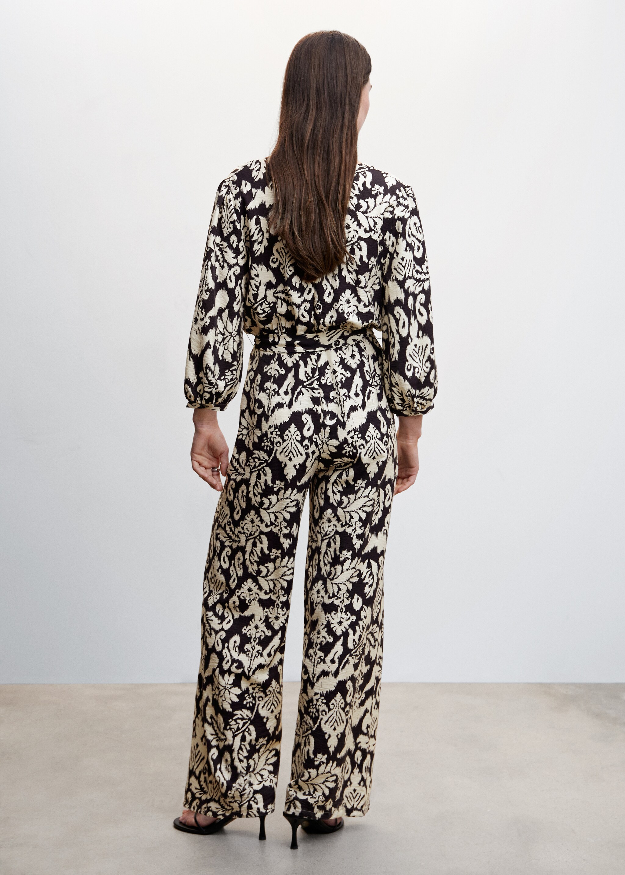 Geometric-print jumpsuit with bow - Reverse of the article