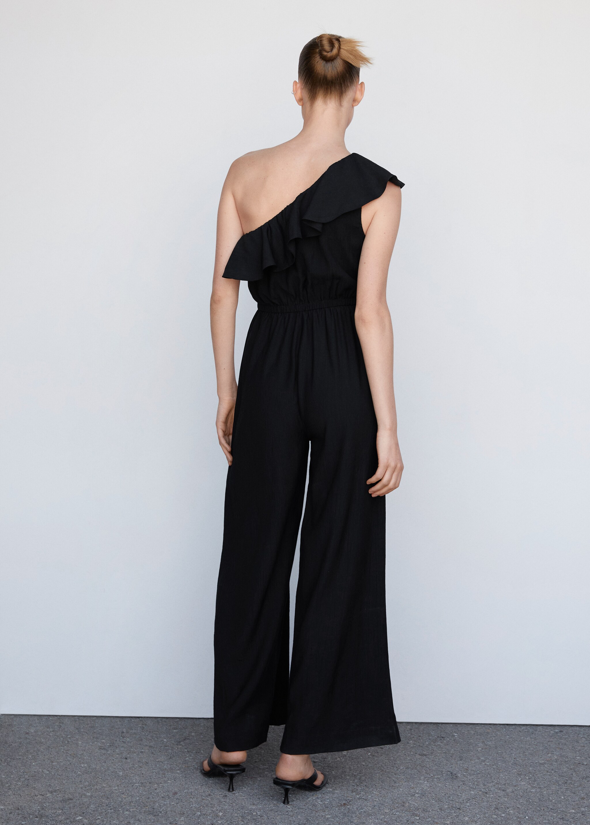 Ruffled asymmetric jumpsuit - Reverse of the article