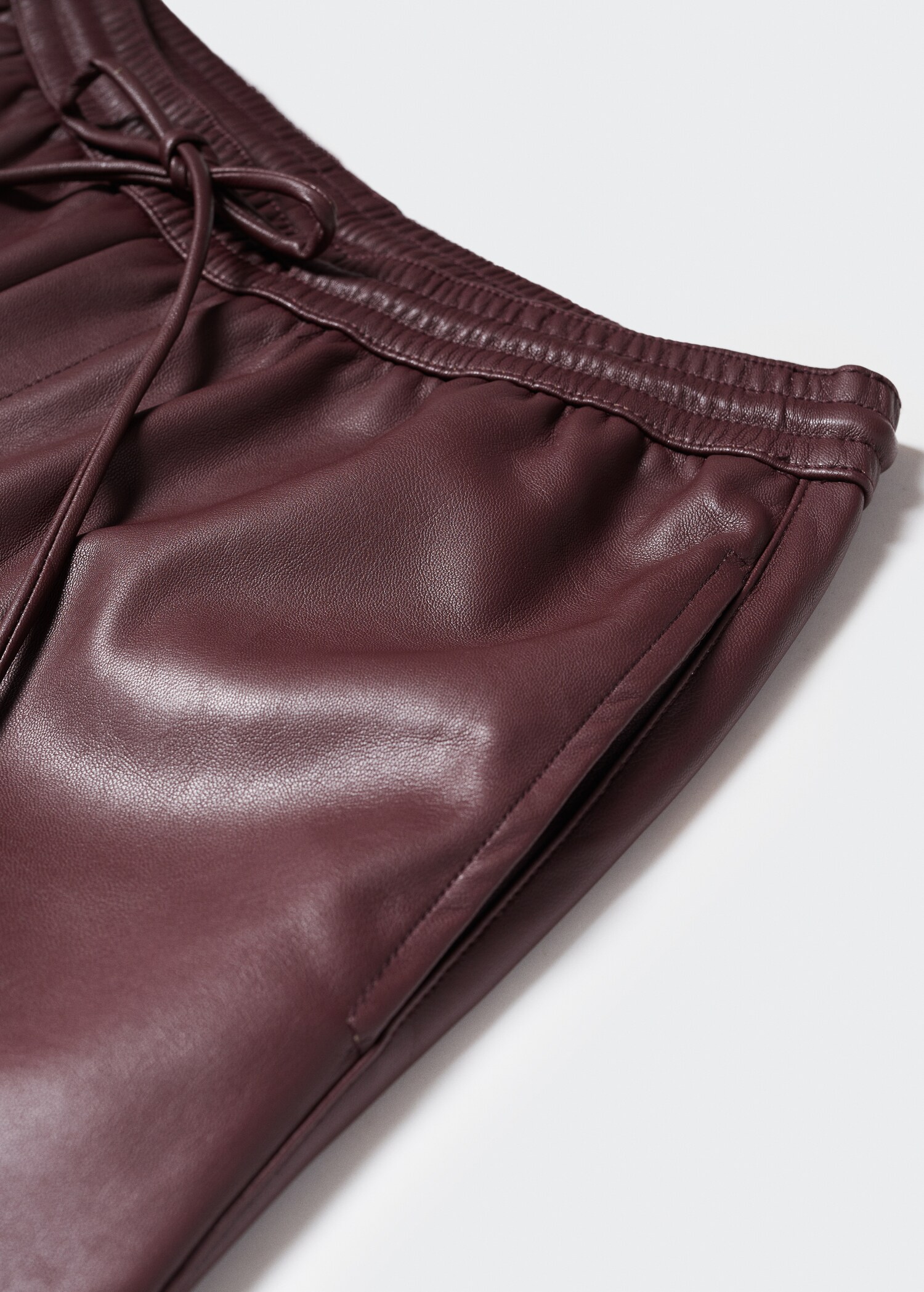 Leather-effect elastic waist trousers - Details of the article 8