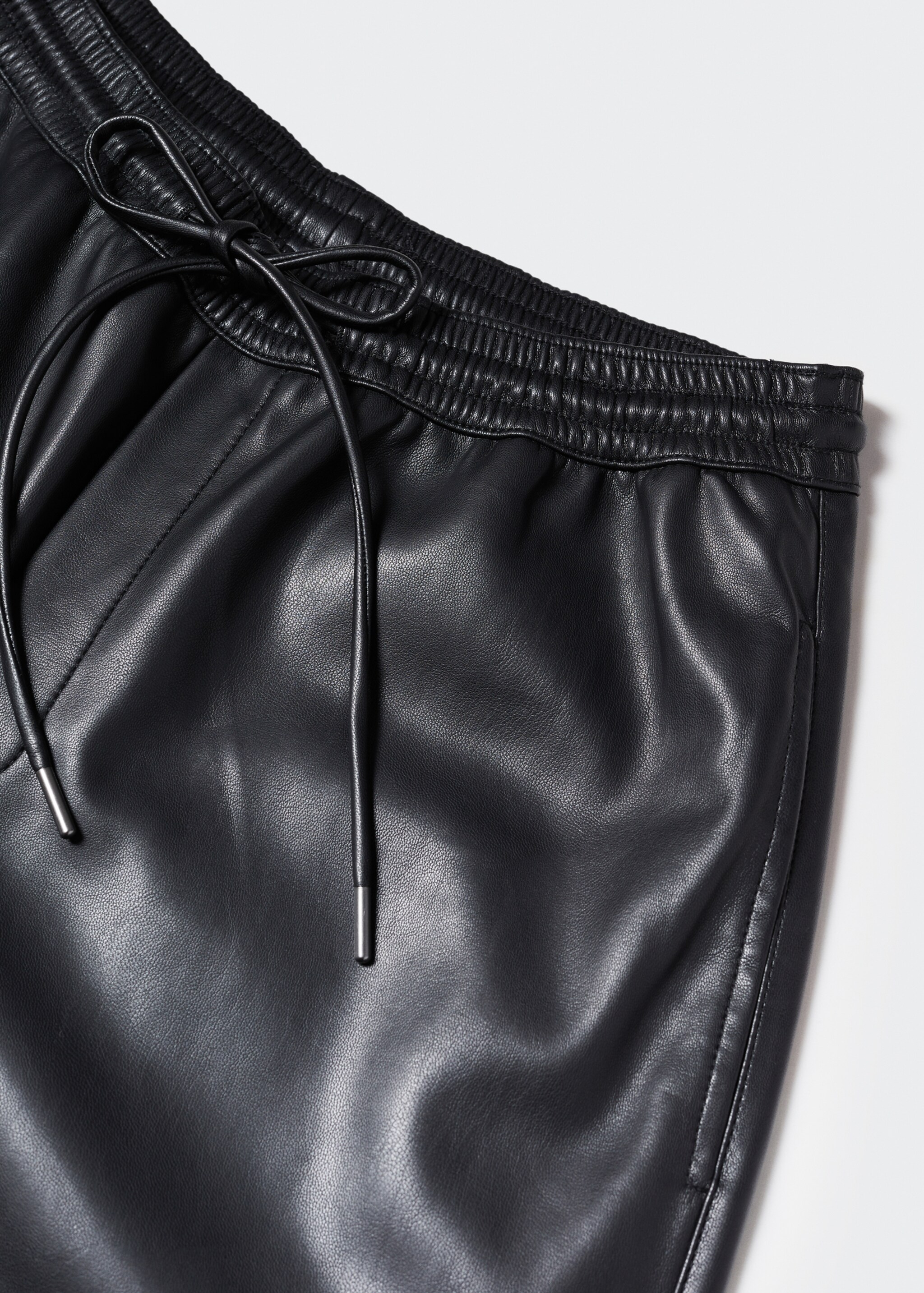 Leather-effect elastic waist trousers - Details of the article 8