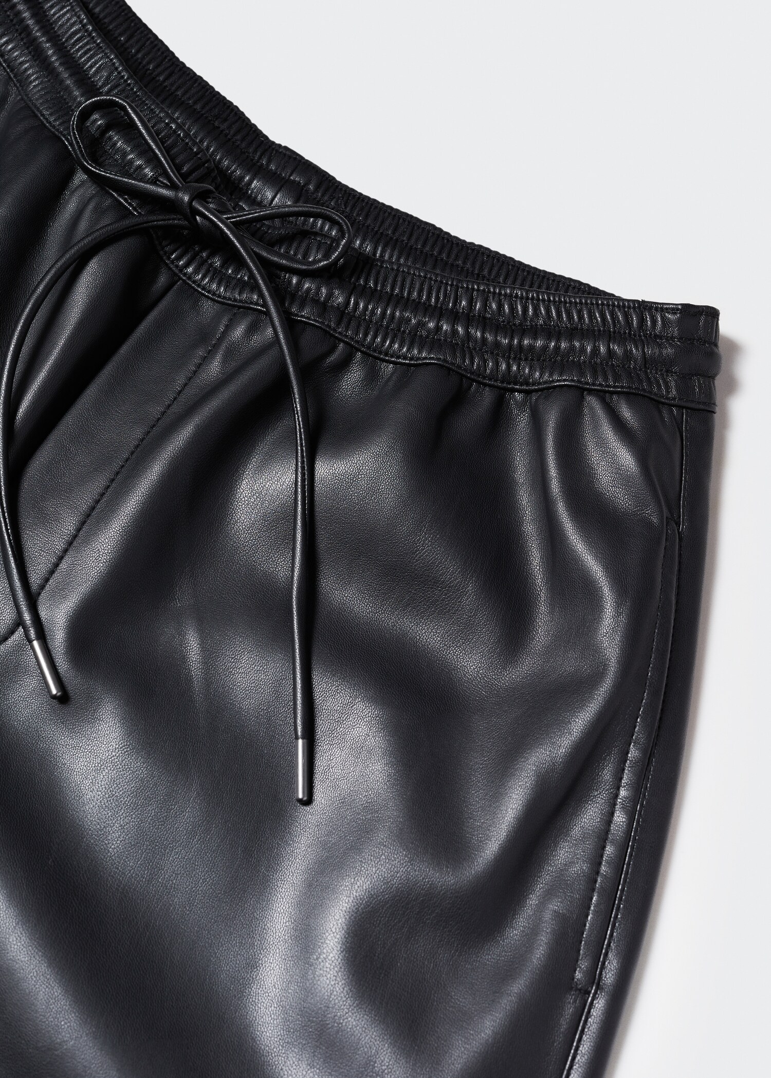 Leather-effect elastic waist trousers - Details of the article 8