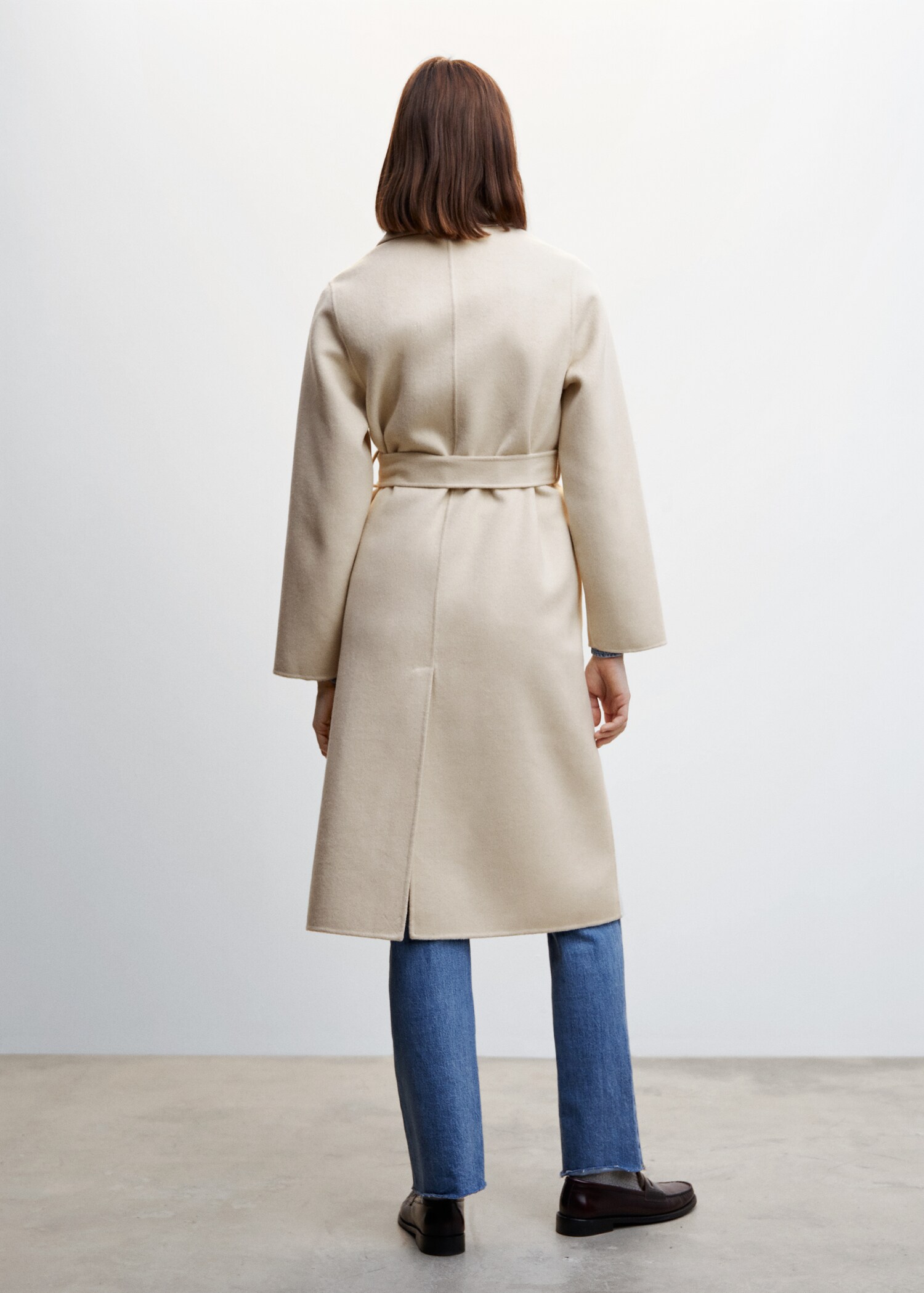 Manteau fait main avec ceinture - Verso de l’article