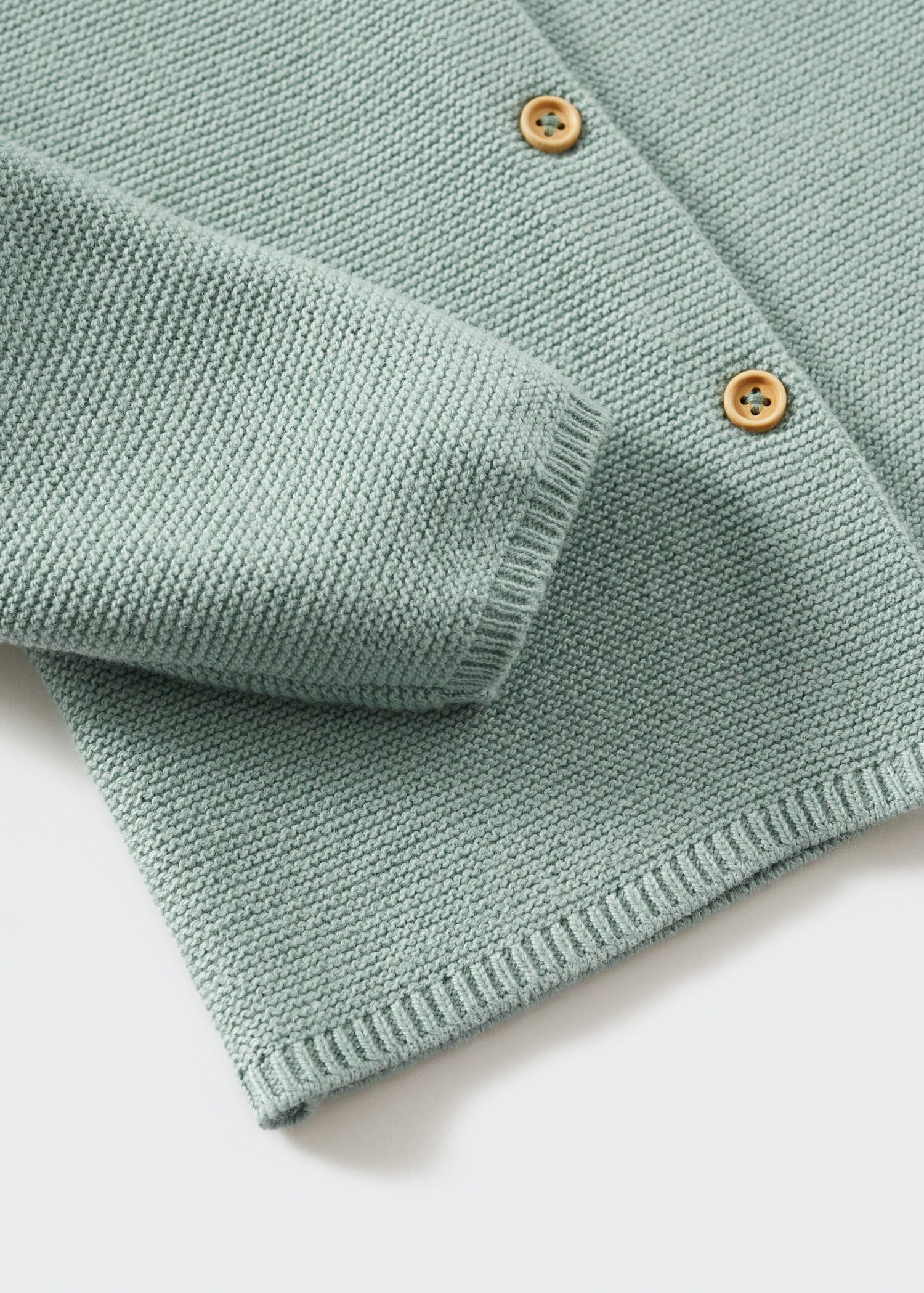 Strickjacke mit Knöpfen - Detail des Artikels 8