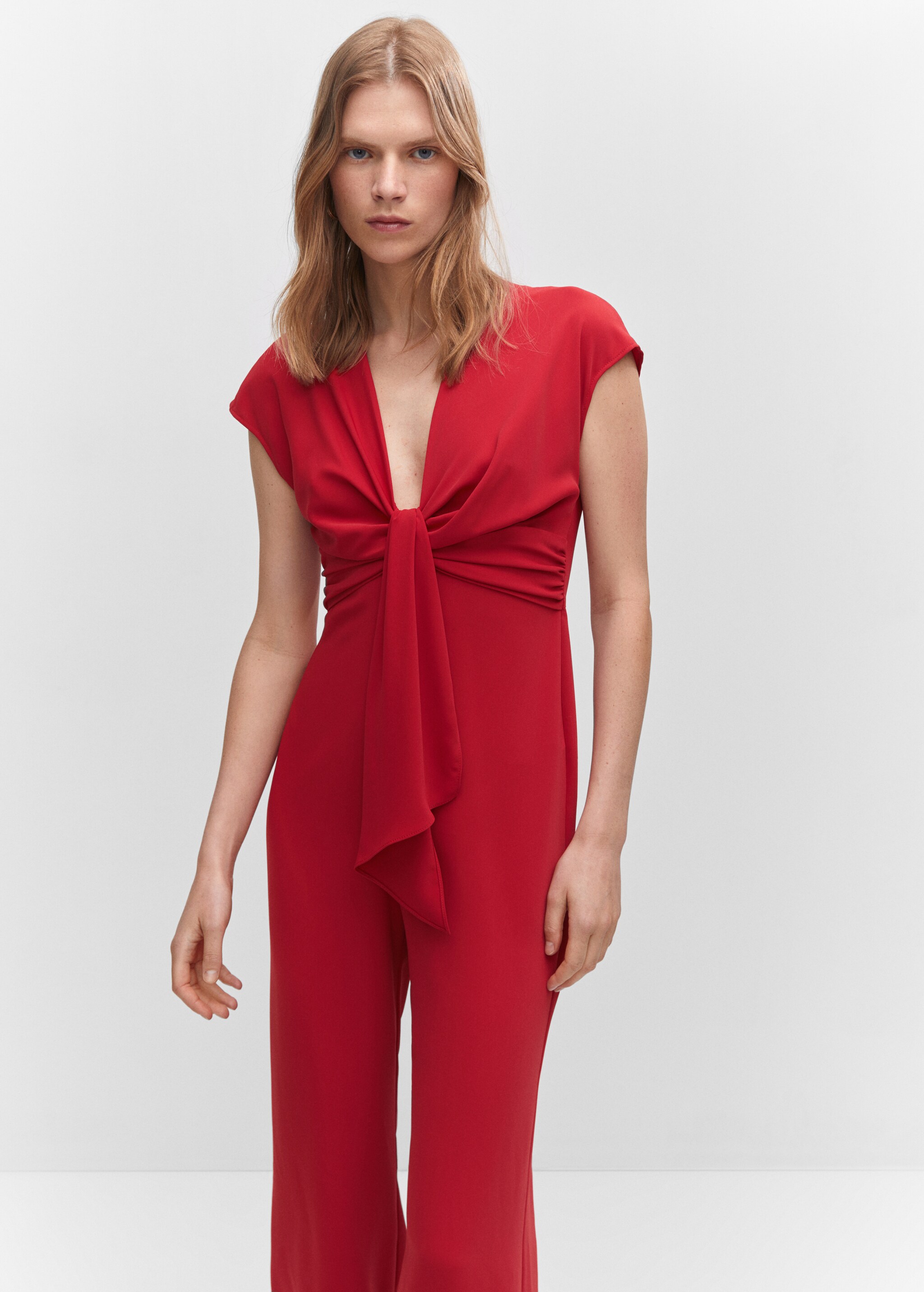 Short-sleeved jumpsuit with knot detail - Medium plane