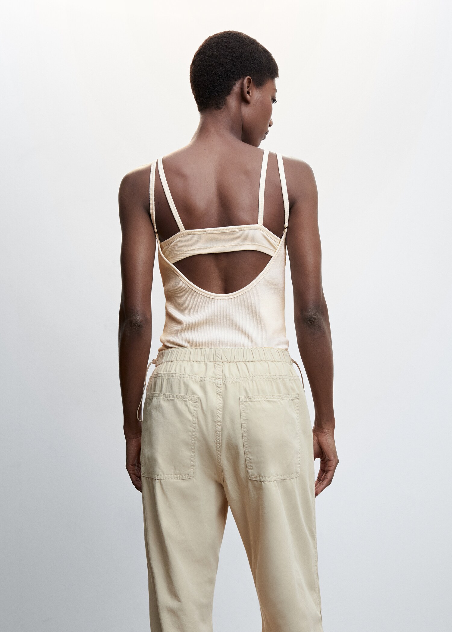 Combined knit top with opening - Reverse of the article