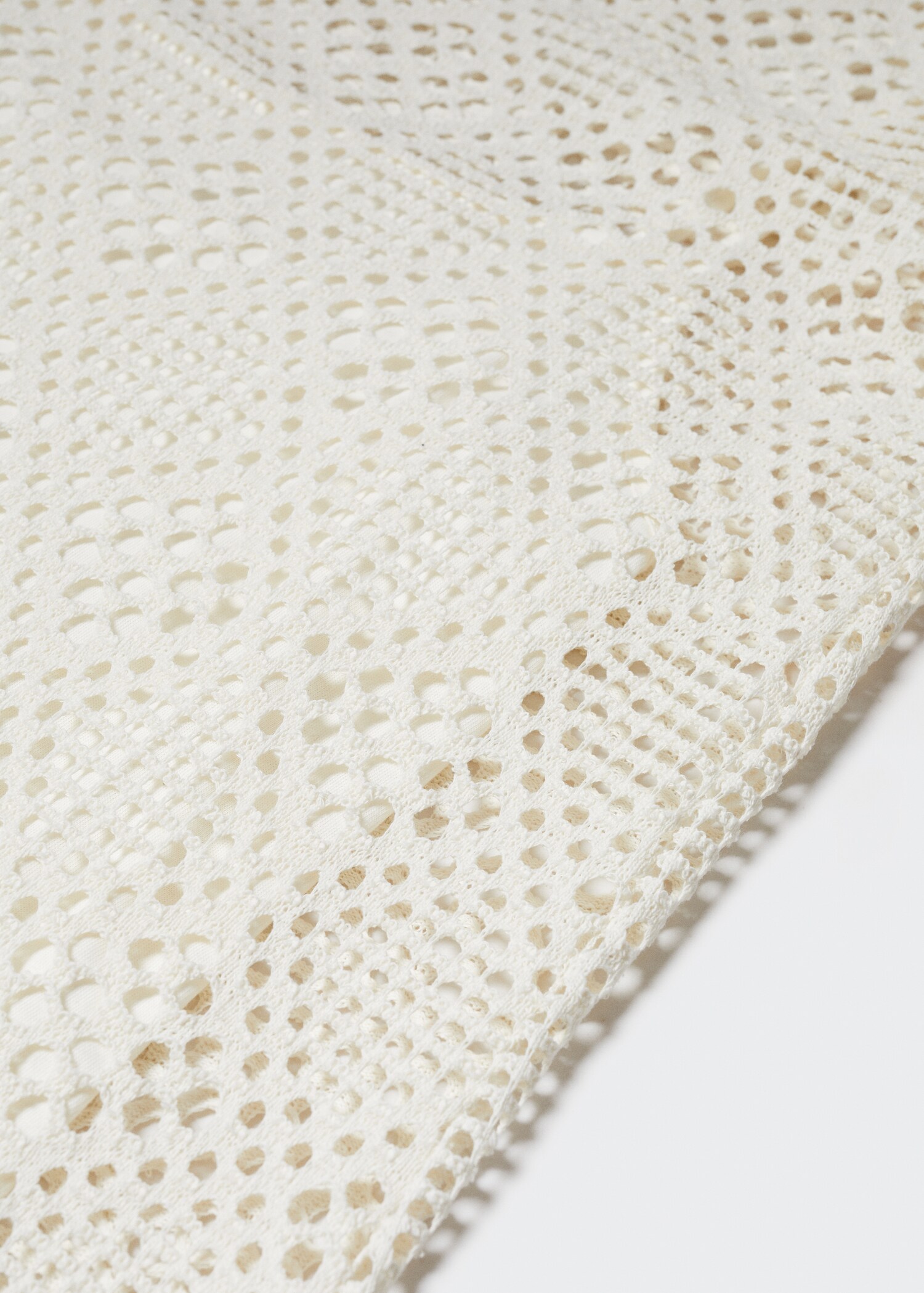 Kleid mit geometrischem Lochmuster - Detail des Artikels 8
